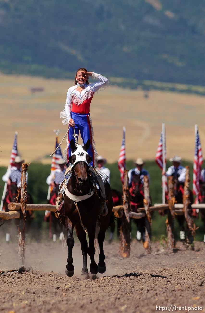 Paige Hadlock, a 12-year-old from Ogden, performs the Hippodrome Stand on her horse Jet as a Wild West Show kicks off the Festival of the American West at Wellsville's American West Heritage Center. 2005 National Cutting Horse Association Jr. Youth Western National Champion Paige Hadlock, a 12-year-old from Ogden.