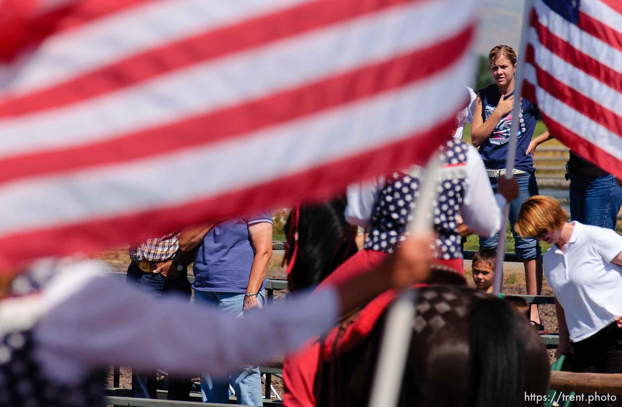 national anthem, flags. A Wild West Show kicks off the Festival of the American West at Wellsville's American West Heritage Center.