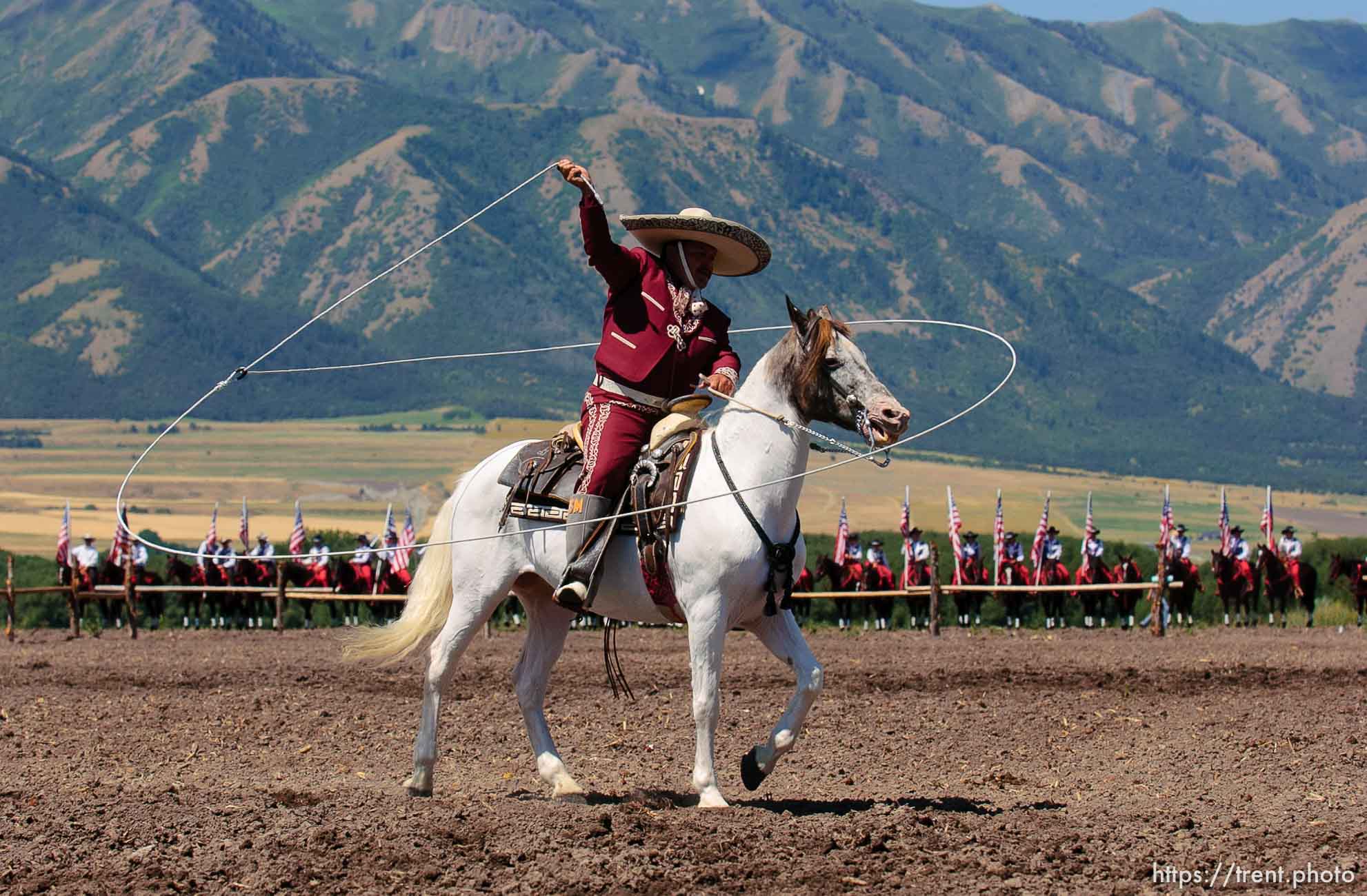 Benny Martinez performs rope tricks on his horse Napoleon. A Wild West Show kicks off the Festival of the American West at Wellsville's American West Heritage Center.