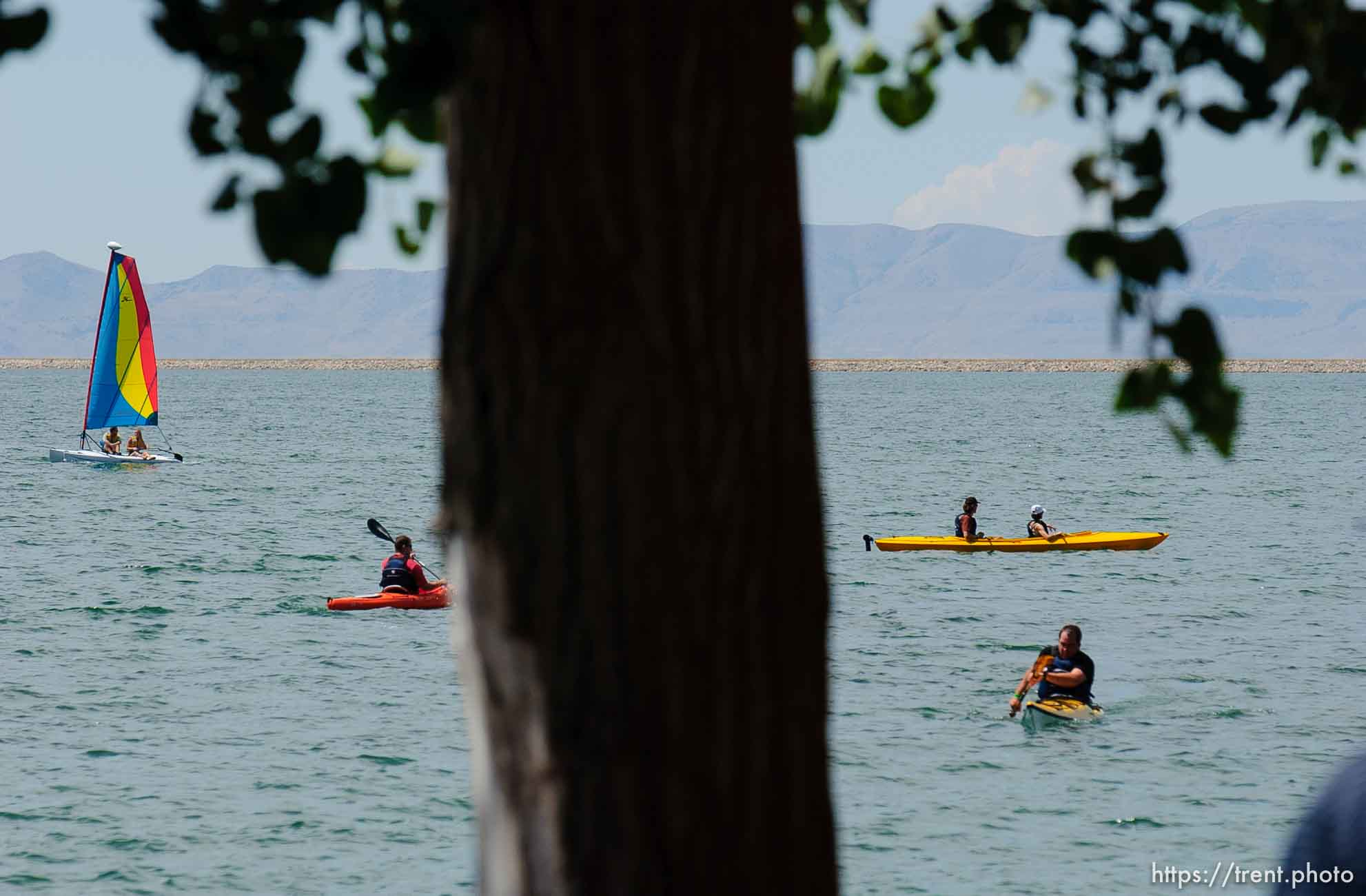 Vendors and retailers took to the waters of the Willard Bay State Park Wednesday, trying out kayaks, canoes, and other watercraft as part of the Outdoor Retailer's Open Air Demo.