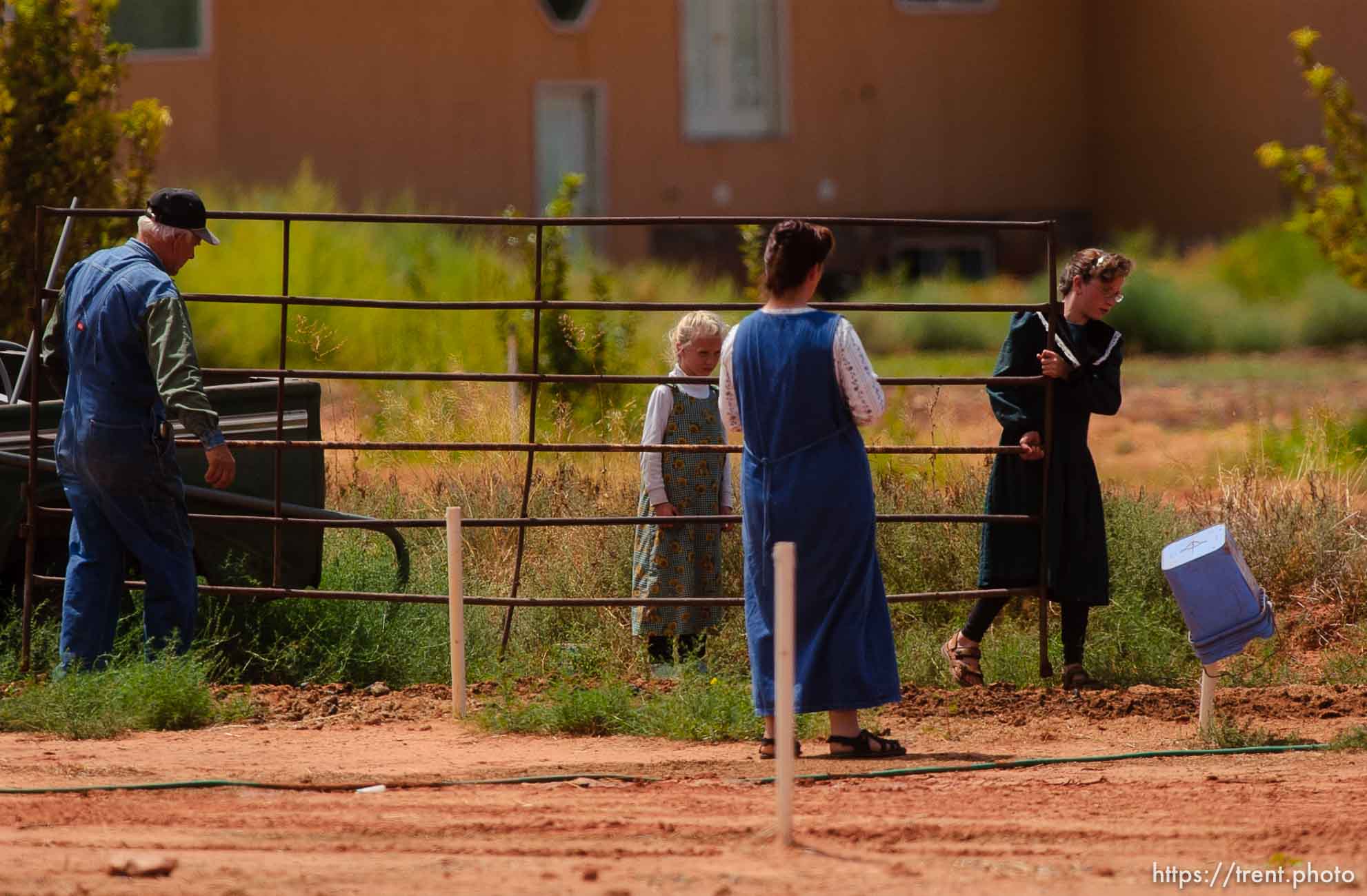 Family working in yard, Colorado City