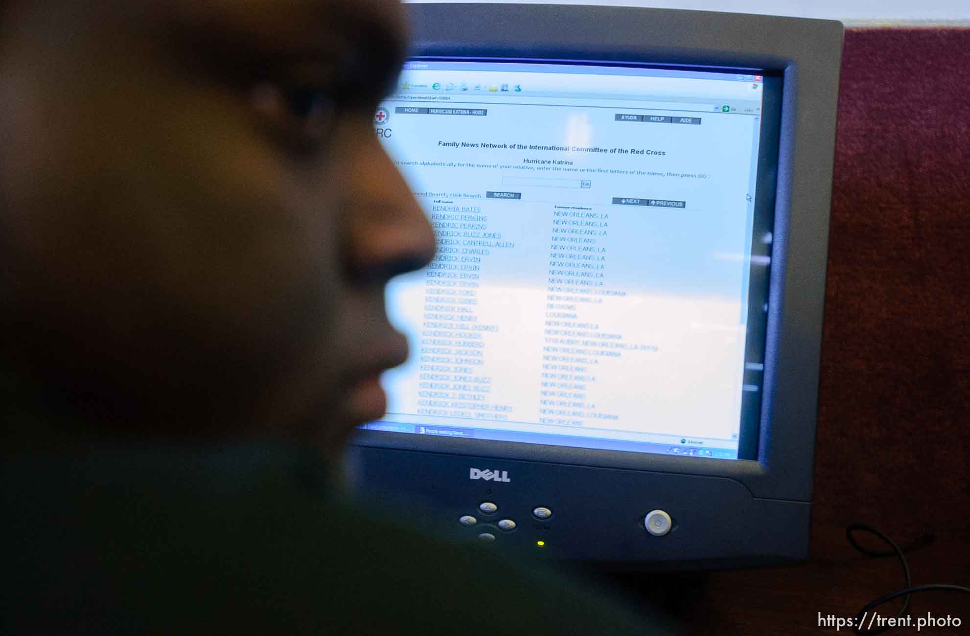 Cornell Perkins, 20, looks for family members on a computer database maintained by the Red Cross. An internet cafe has been set up in the activity center at Camp Williams, where people who were evacuated from the hurricane Katrina disaster in New Orleans, are making a go of it.