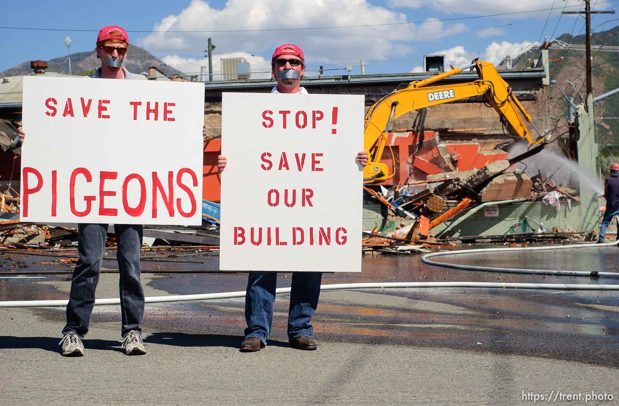 guys who used to work in the paint store making a half-serious protest. Destruction of the Video Vern's building at 4800 South Holladay Boulevard began Friday afternoon. The building to the south of Video Vern's, which house the Holladay Color Center paint store for approximately forty years, was demolished Friday afternoon.