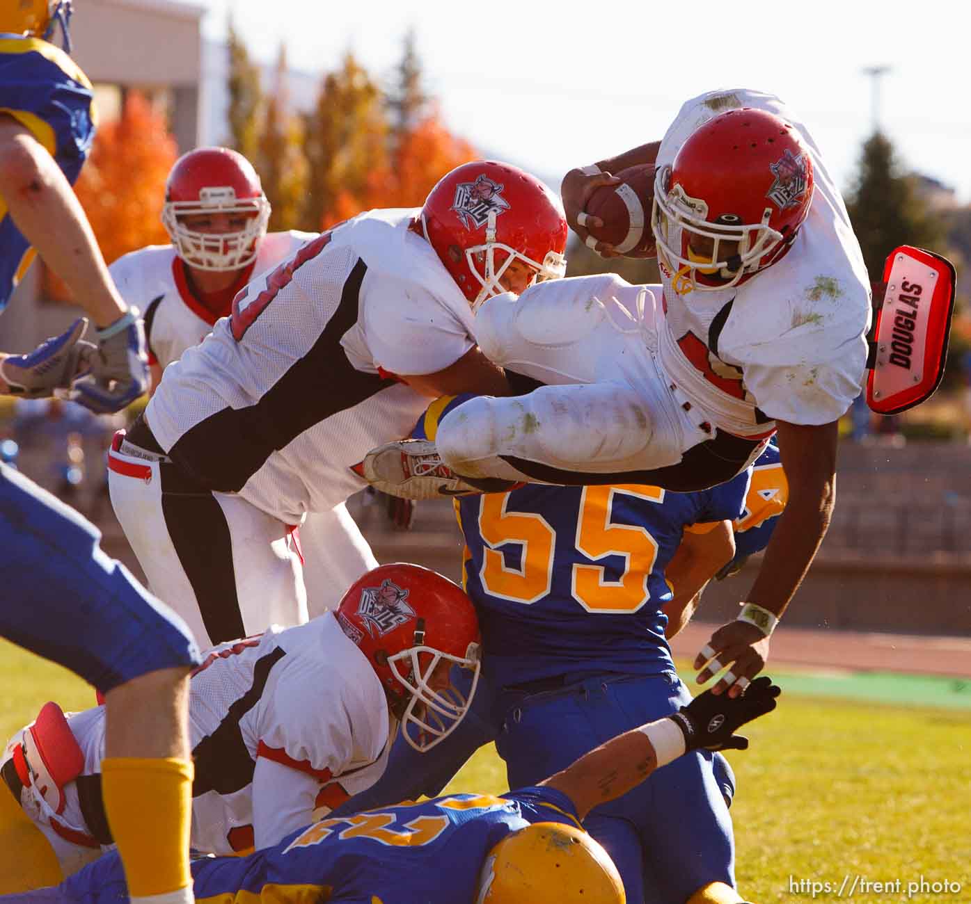 Grand's Tanner Brown flies into the end zone for a touchdown. Grand vs. San Juan, 2A State Football Championship game at Southern Utah University's Eccles Coliseum in Cedar City.