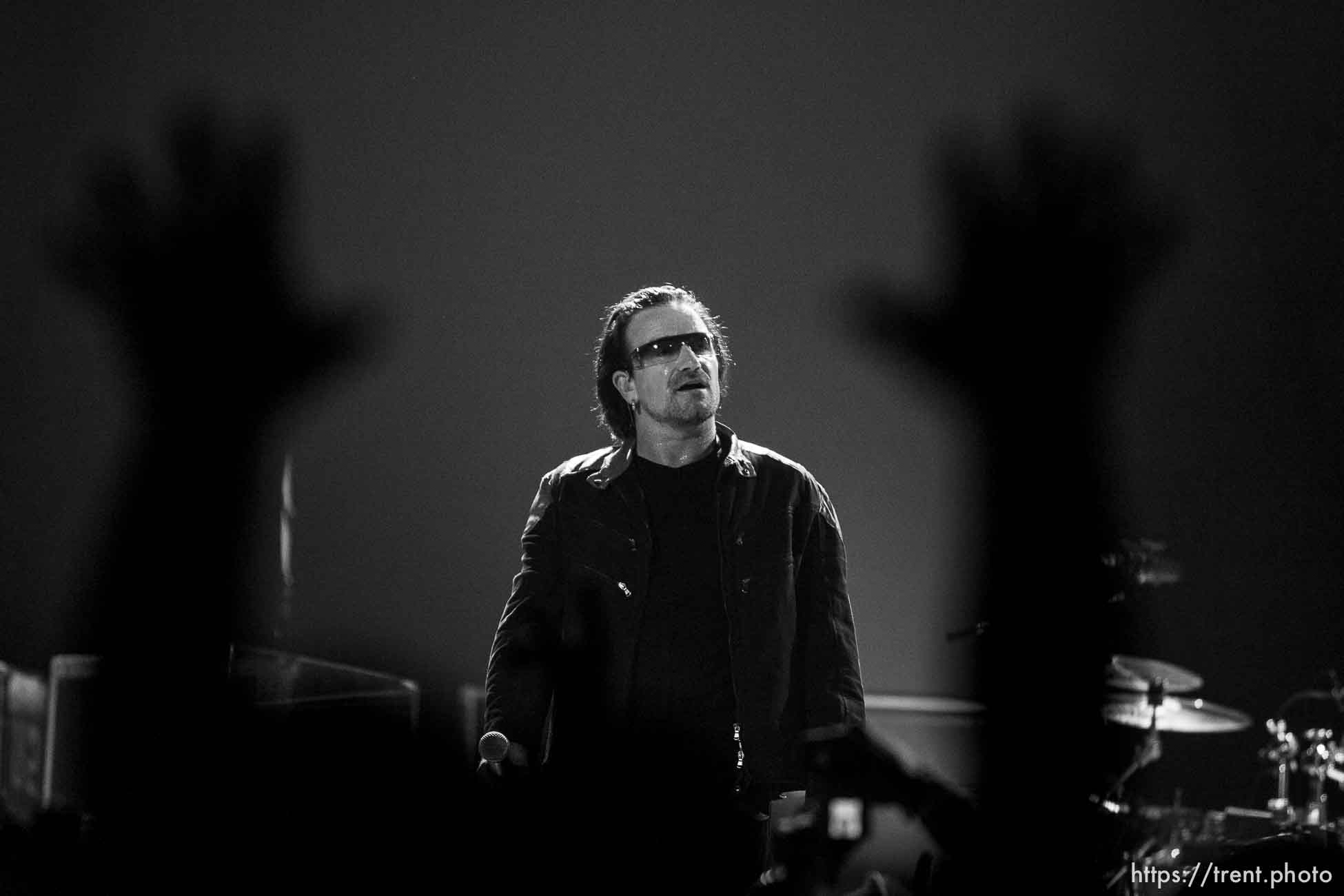 U2 performs at the Delta Center.