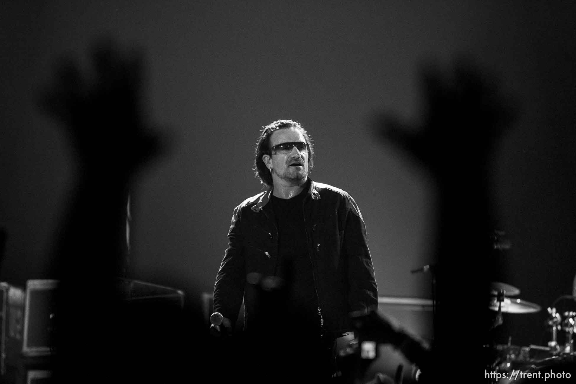 U2 performs at the Delta Center.