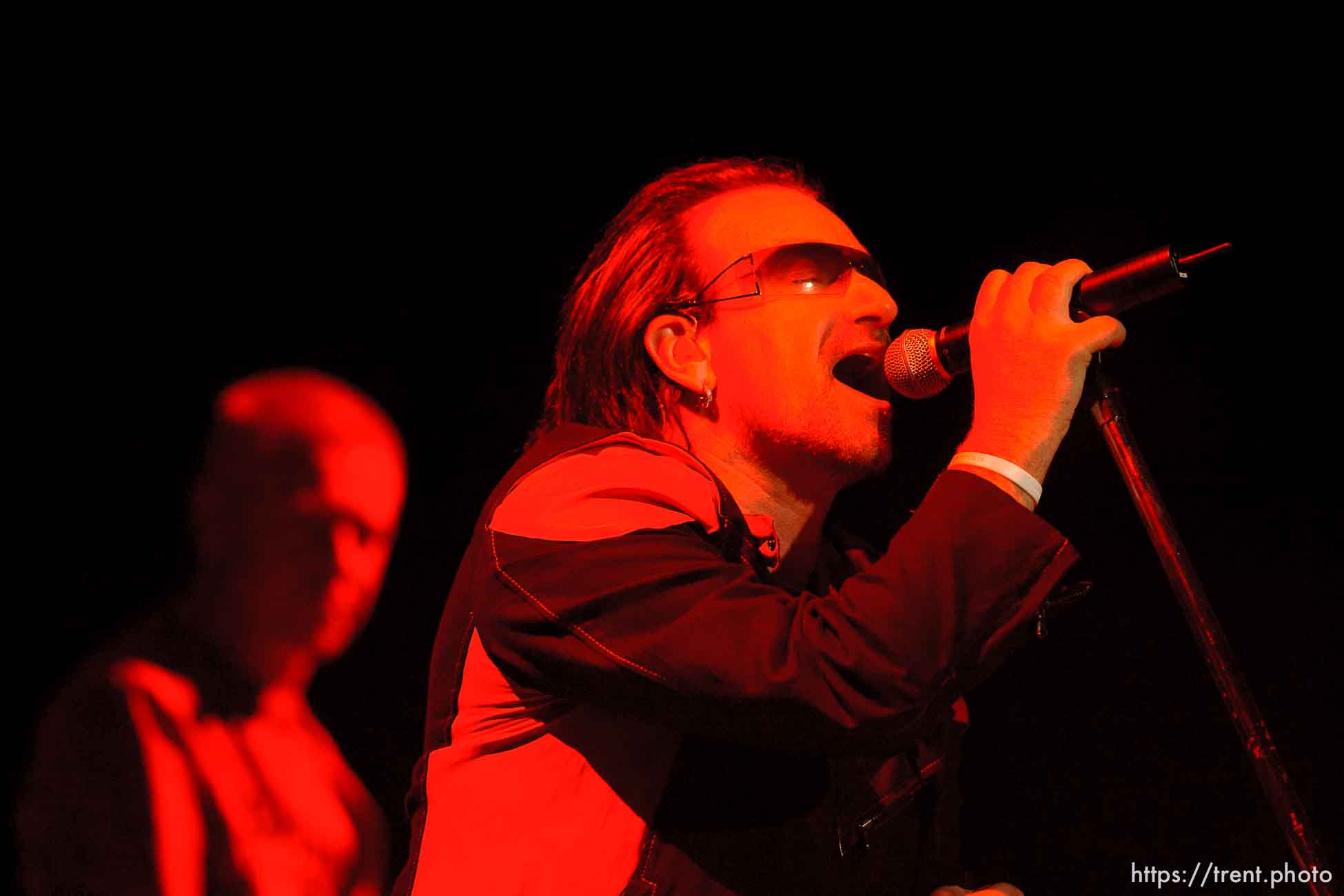 U2 performs at the Delta Center.