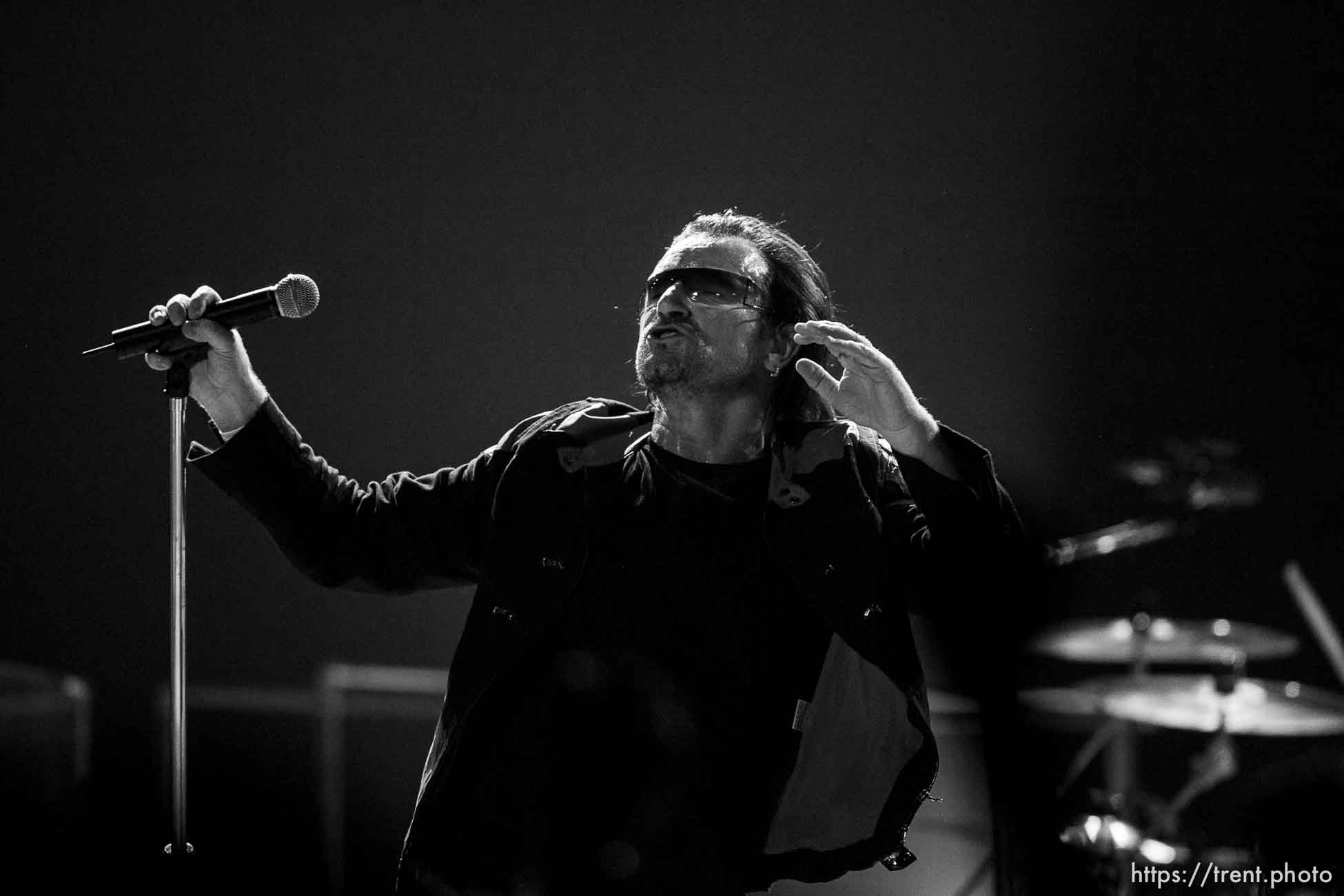 U2 performs at the Delta Center.