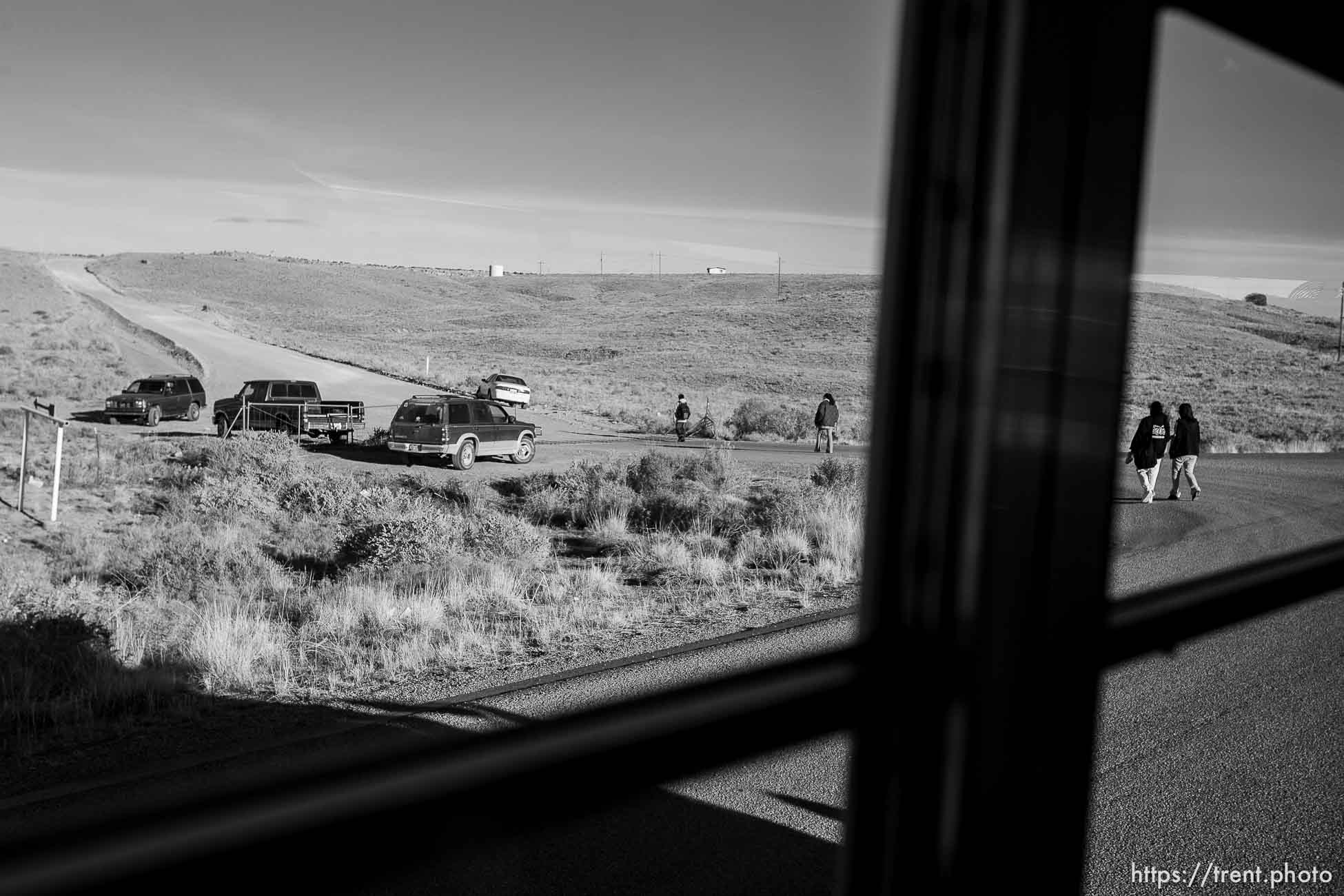 navajo kids being dropped off after school via bus.