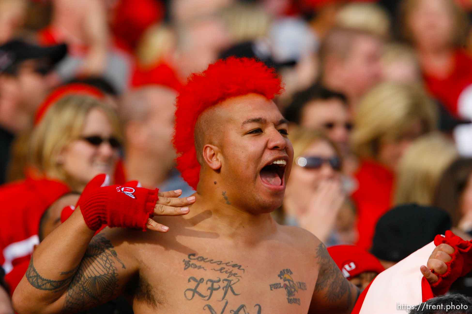 Utah fan draws his hand across his neck after Utah's Steve Tate intercepted a Georgia Tech pass, first half. University of Utah vs. Georgia Tech, Emerald Bowl, San Francisco.