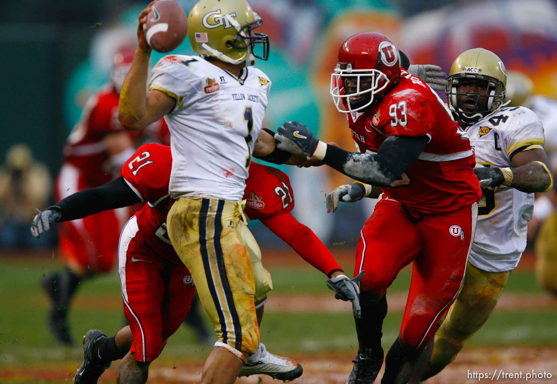 Utah's Shaun Harper (left) and Martail Burnett pressure Georgia Tech QB Reggia Ball. Ball threw the ball away. University of Utah vs. Georgia Tech, Emerald Bowl, San Francisco.