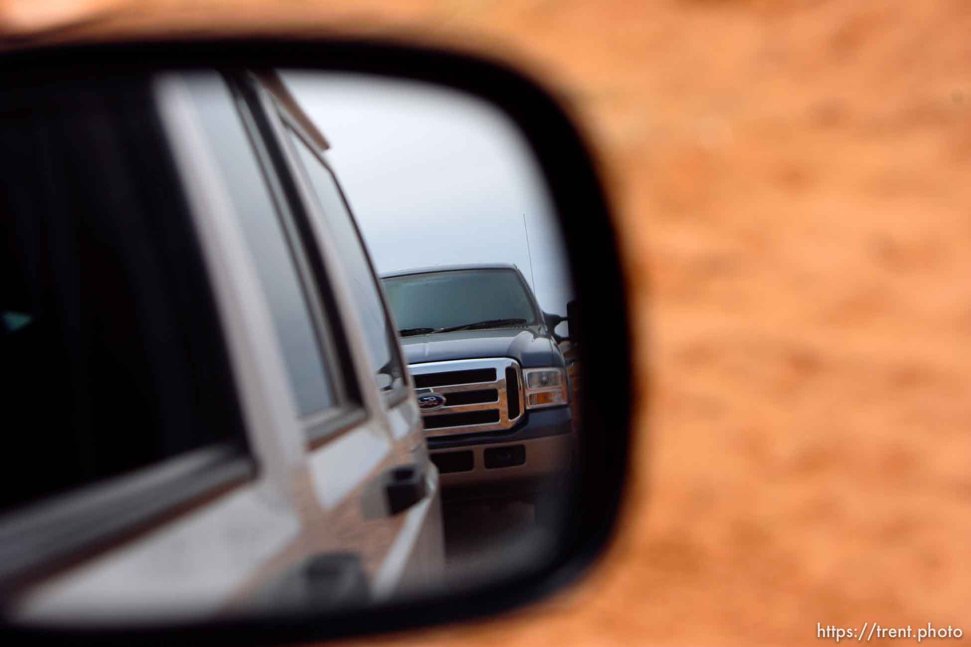 Tinted-window truck following Gary Engels as intimidation tactic in Colorado City. 