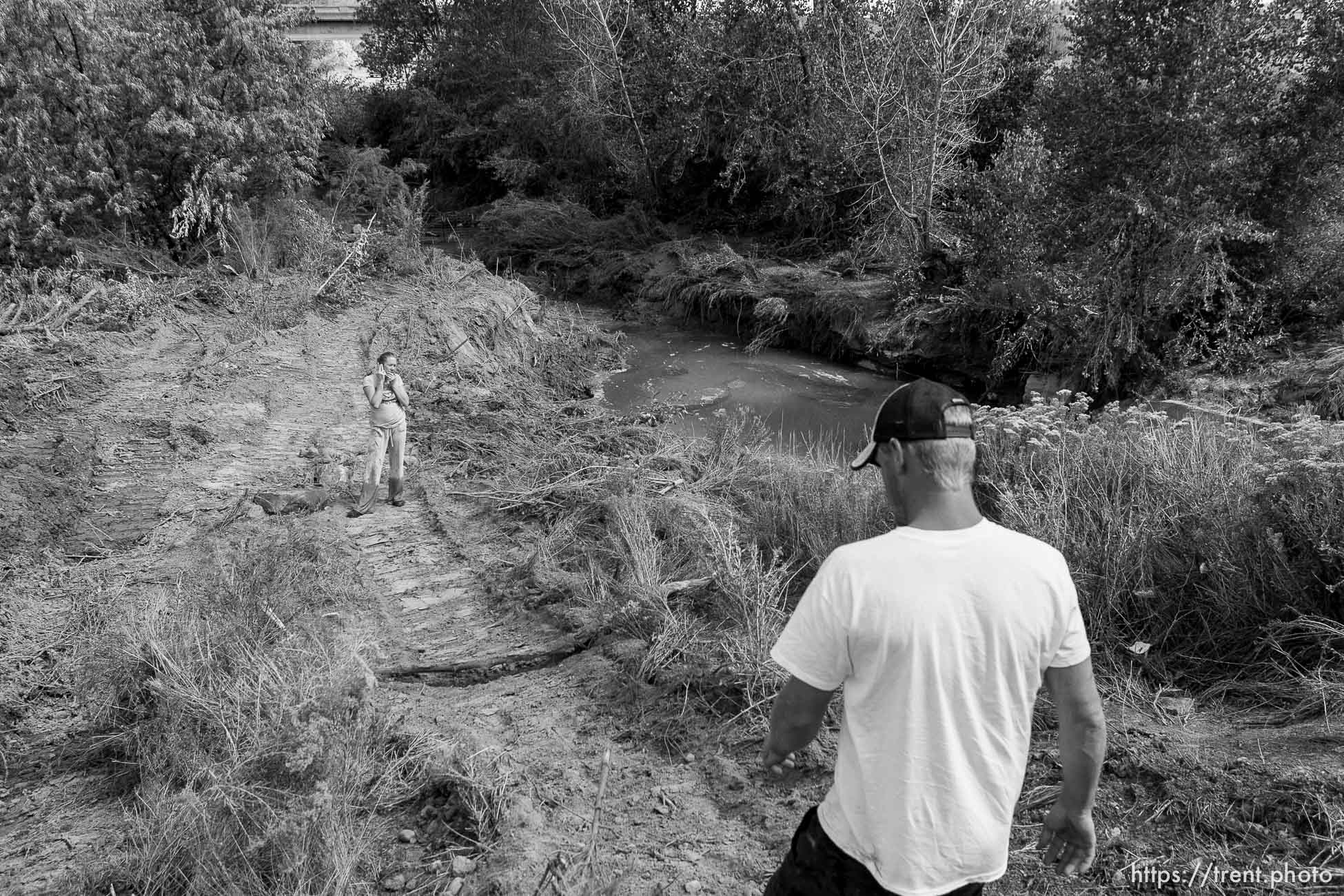 Helper - Courtney and Josh Seal continue to search the Price River for the body of their missing one-year-old son Jayden, who was washed away when a flash flood slammed into the family's vehicle July 30. The couple's 5-year-old son Levi died in the accident.; 8.17.2006