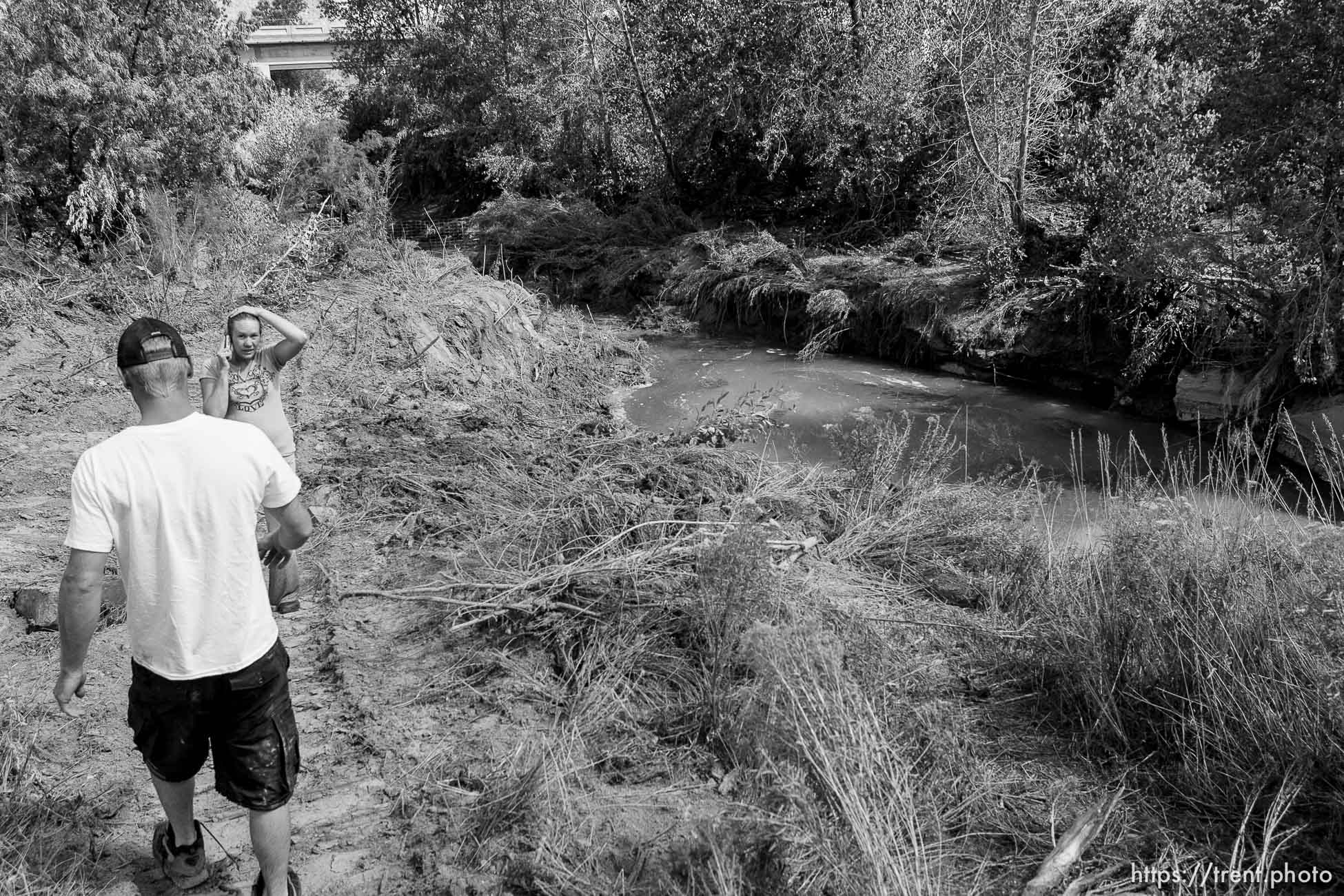 Helper - Courtney and Josh Seal continue to search the Price River for the body of their missing one-year-old son Jayden, who was washed away when a flash flood slammed into the family's vehicle July 30. The couple's 5-year-old son Levi died in the accident.; 8.17.2006