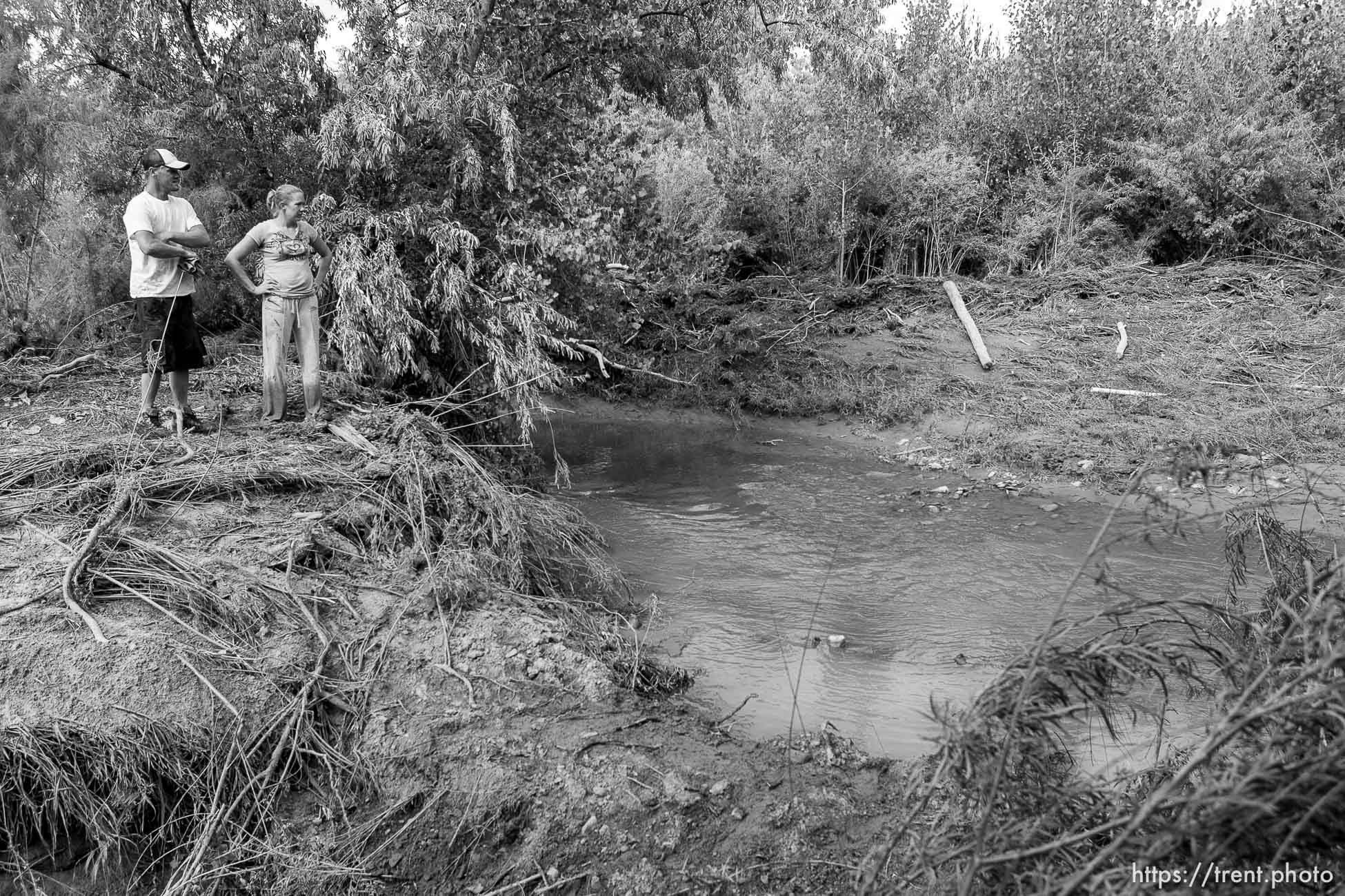 Helper - Courtney and Josh Seal continue to search the Price River for the body of their missing one-year-old son Jayden, who was washed away when a flash flood slammed into the family's vehicle July 30. The couple's 5-year-old son Levi died in the accident.; 8.17.2006