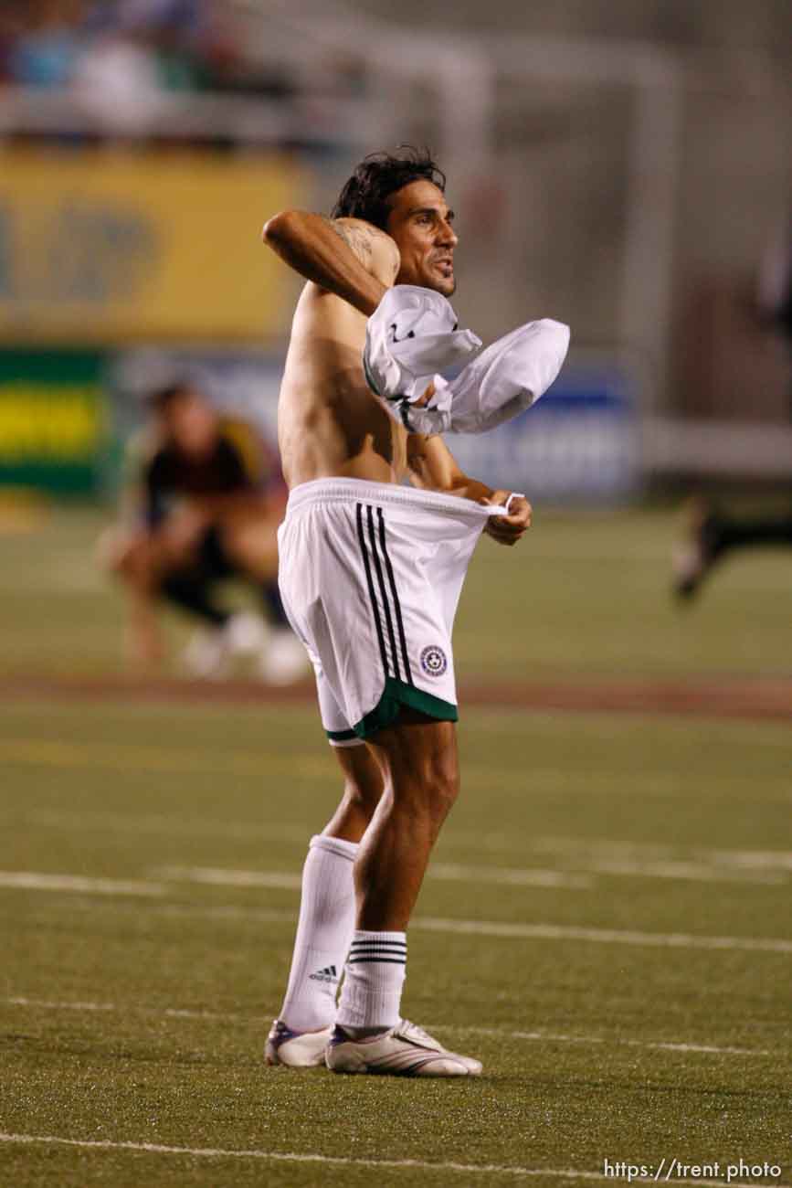 Colorado captain Pablo Mastroeni taunts Real fans after the game. He then stuffed his jersey down his pants and slapped his hip. Real Salt Lake vs. Colorado Rapids MLS soccer at Rice-Eccles Stadium. Rapids win 1-0.; 9.02.2006