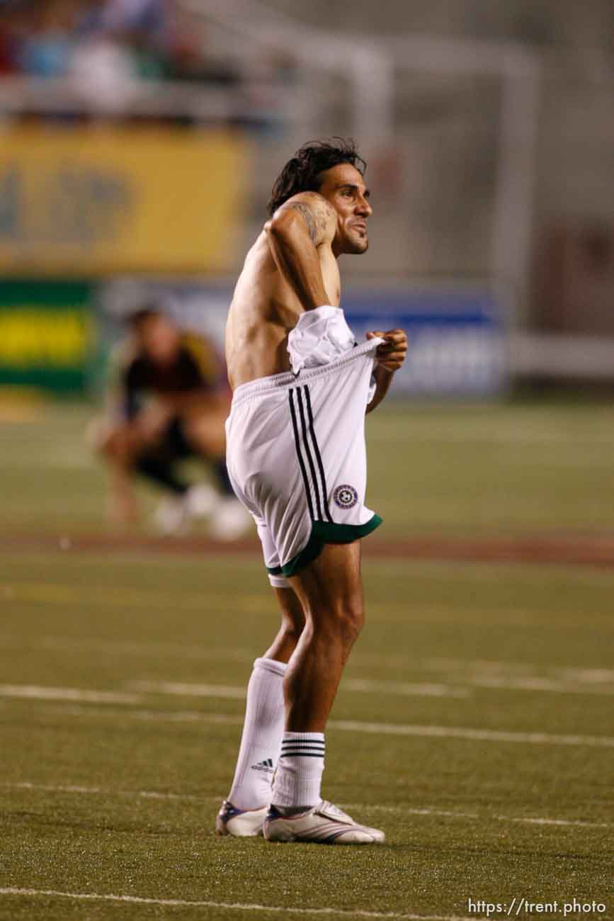 Colorado captain Pablo Mastroeni taunts Real fans after the game. He then stuffed his jersey down his pants and slapped his hip. Real Salt Lake vs. Colorado Rapids MLS soccer at Rice-Eccles Stadium. Rapids win 1-0.; 9.02.2006