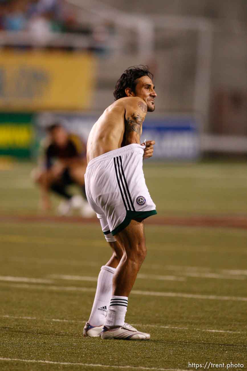 Colorado captain Pablo Mastroeni taunts Real fans after the game. He then stuffed his jersey down his pants and slapped his hip. Real Salt Lake vs. Colorado Rapids MLS soccer at Rice-Eccles Stadium. Rapids win 1-0.; 9.02.2006