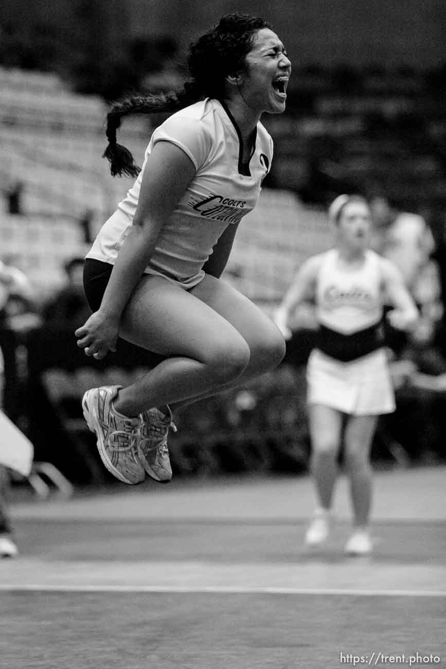 Orem - Cottonwood's Trustine Mendoza leaps for joy as Cottonwood defeats Murray for the 4A state championship, girls high school volleyball at UVSC.