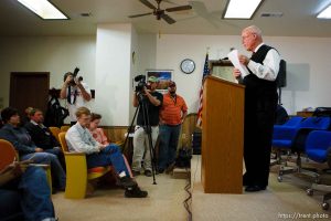 Hildale - Special Fiduciary Bruce Wisan (right) with his attorney Jeff Shields (center) addressed residents of Hildale, UT and Colorado City, AZ, providing details on the United Effort Plan (UEP) property trust at a meeting held at the Hildale City Hall.