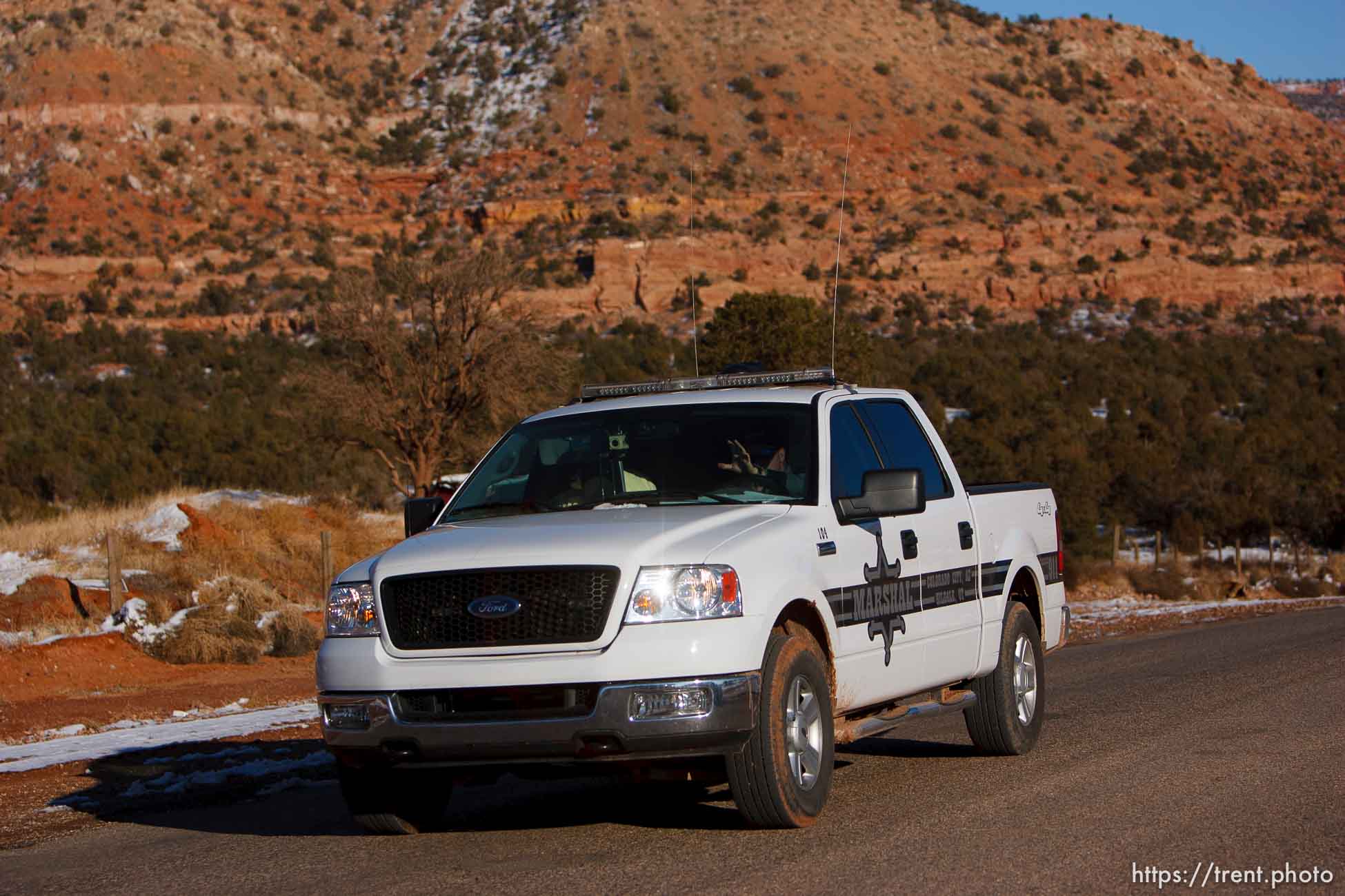 Hildale - A Marshal with the FLDS Hildale/Colorado City Town Marshals on patrol in Hildale, Utah.. for FLDS Hildale/Colorado City Town Marshal story; 12.20.2006