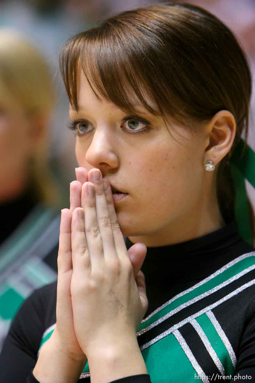 Ogden - Payson cheerleader Caitlin Corbett holds out hope for her team, down three points with 15 seconds left. Provo went on to win. Provo vs. Payson High School boys basketball, 4A State Basketball Championship Game at the Dee Events Center Wednesday.