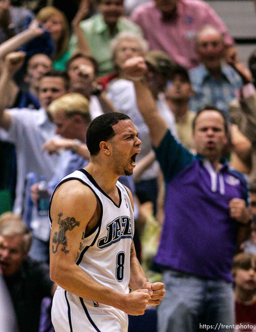 Salt Lake City - Utah Jazz guard Deron Williams (8) lets out a primal scream immediately after he makes a shot and is fouled, putting the Jazz up 62-49. Utah Jazz vs. Houston Rockets, game 4, 1st round NBA Playoffs.