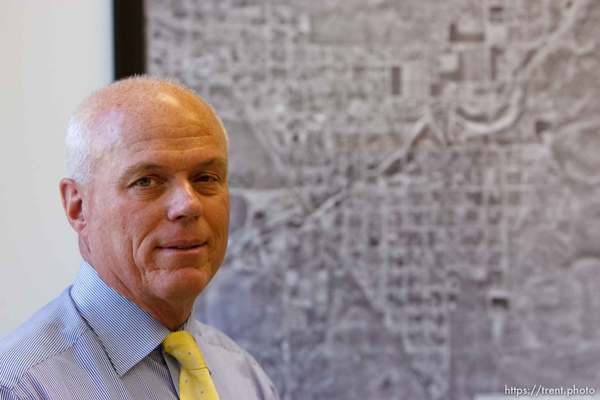 Salt Lake City - Special fiduciary Bruce R. Wisan in his office with an aerial map of Hildale and Colorado City. Wisan is a court-appointed fiduciary managing the United Effort Plan (UEP) property trust that FLDS leader Warren Jeffs once oversaw.; 5.01.2007