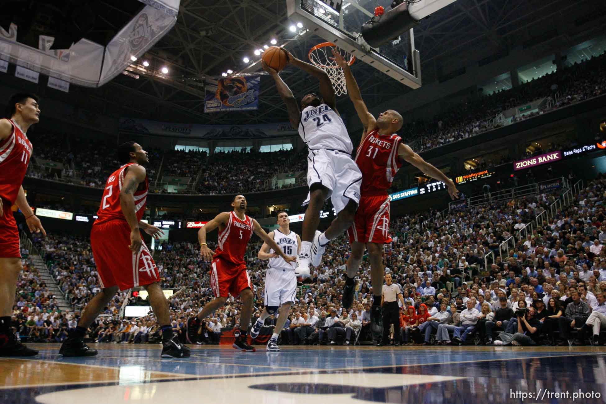 Salt Lake City - Utah Jazz vs. Houston Rockets, game 6, NBA playoffs first round. Utah Jazz forward Paul Millsap (24) shooting, Houston Rockets forward Shane Battier (31) defending.