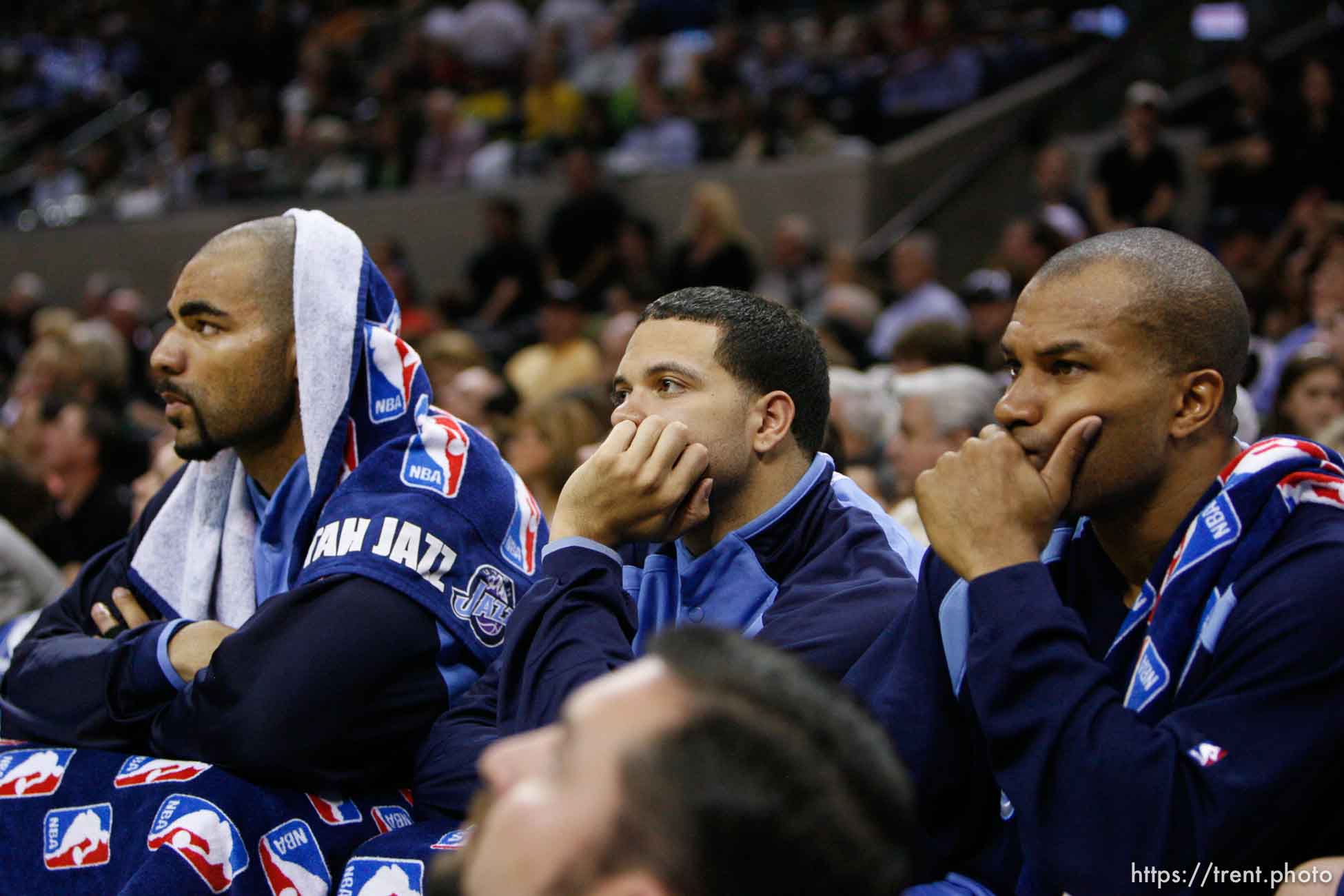 San Antonio - On the bench with 1:32 left in the game, trailing 106-78, (left to right), Utah Jazz forward Carlos Boozer (5), Utah Jazz guard Deron Williams (8), and Utah Jazz guard Derek Fisher (2). Utah Jazz vs. San Antonio Spurs, Western Conference Finals game five at the AT&T Center.
5.30.2007&#x01;