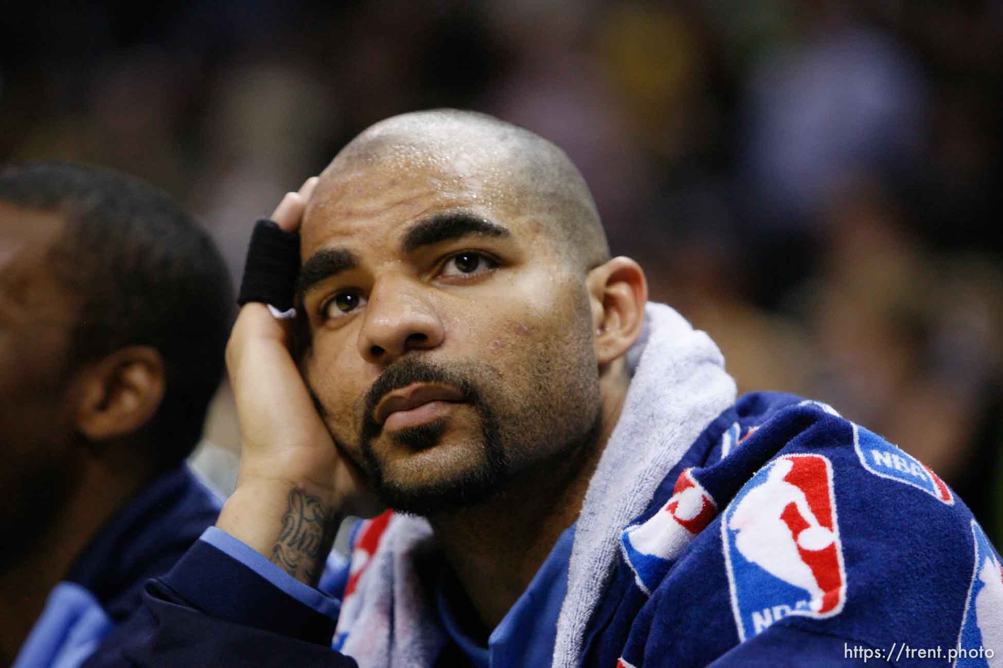 San Antonio - On the bench with 1:32 left in the game, trailing 106-78, (left to right), Utah Jazz forward Carlos Boozer (5). Utah Jazz vs. San Antonio Spurs, Western Conference Finals game five at the AT&T Center.
5.30.2007&#x01;