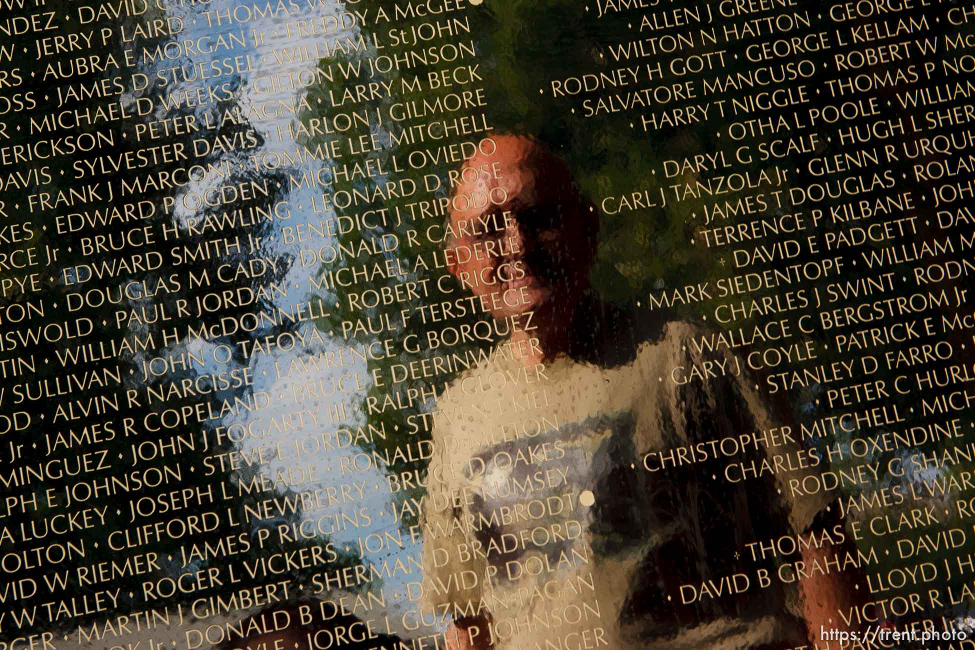 Provo - The Moving Wall, a half-size replica of the national Vietnam Veterans Memorial in Washington D.C., is on display in Provo. A steady stream of visitors paid their respects to the more than 58,000 names memorialized on the wall. gerald hubbard