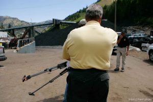 Huntington - Robert Murray, president and CEO of Ohio-based Murray Energy Corp, led reporters on a tour of the Crandall Canyon coal mine Wednesday, where six miners remained trapped. emery county sheriff lamar guymon escorts KSL photographer away from the tour