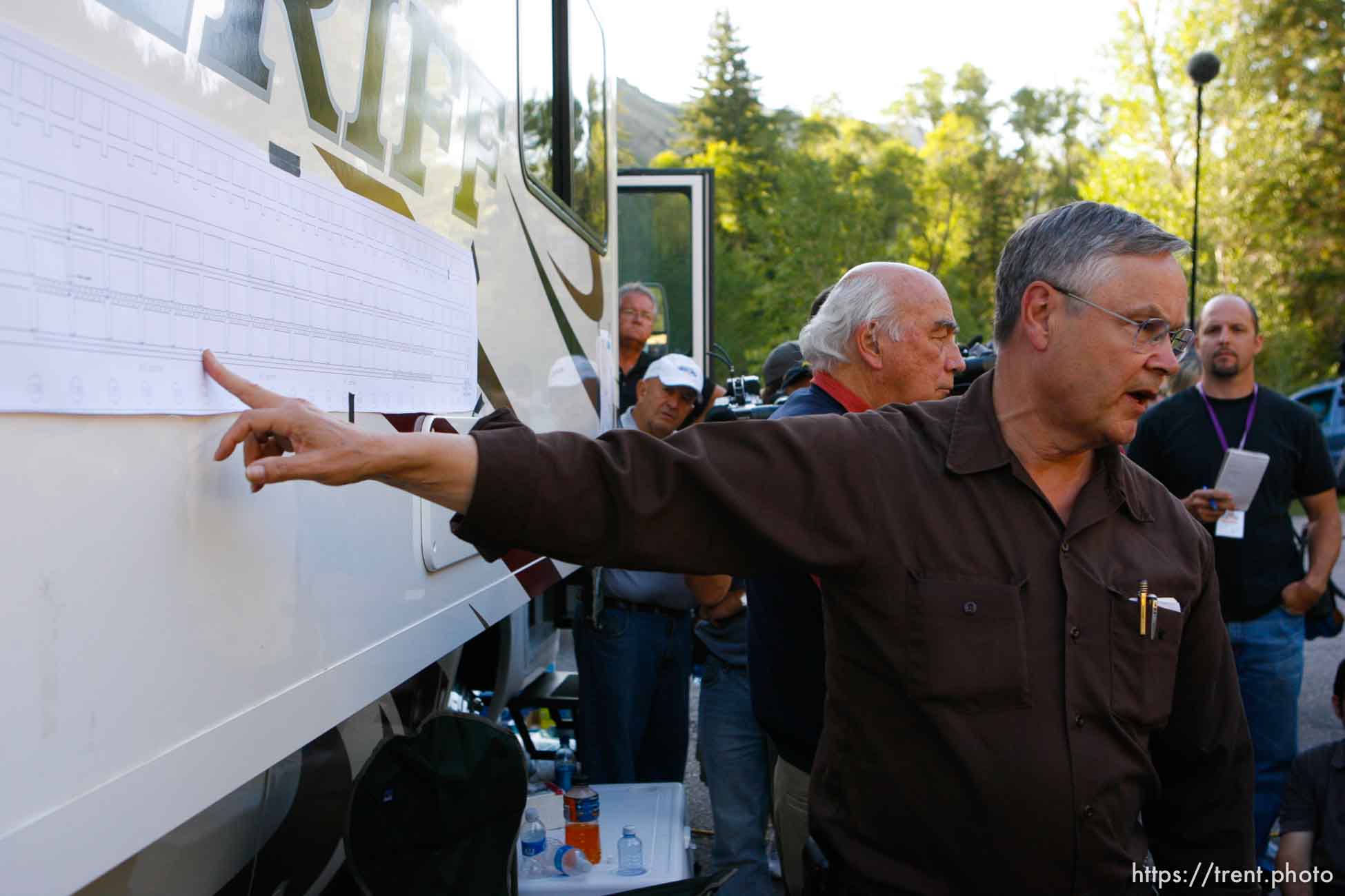 Huntington - Richard Strickler, Assistant Secretary for the Mine Safety and Health Administration speaks to reporters while pointing out locations on a map of the mine Friday evening at the command post for the Crandall Canyon Mine rescue effort.  rob murray behind