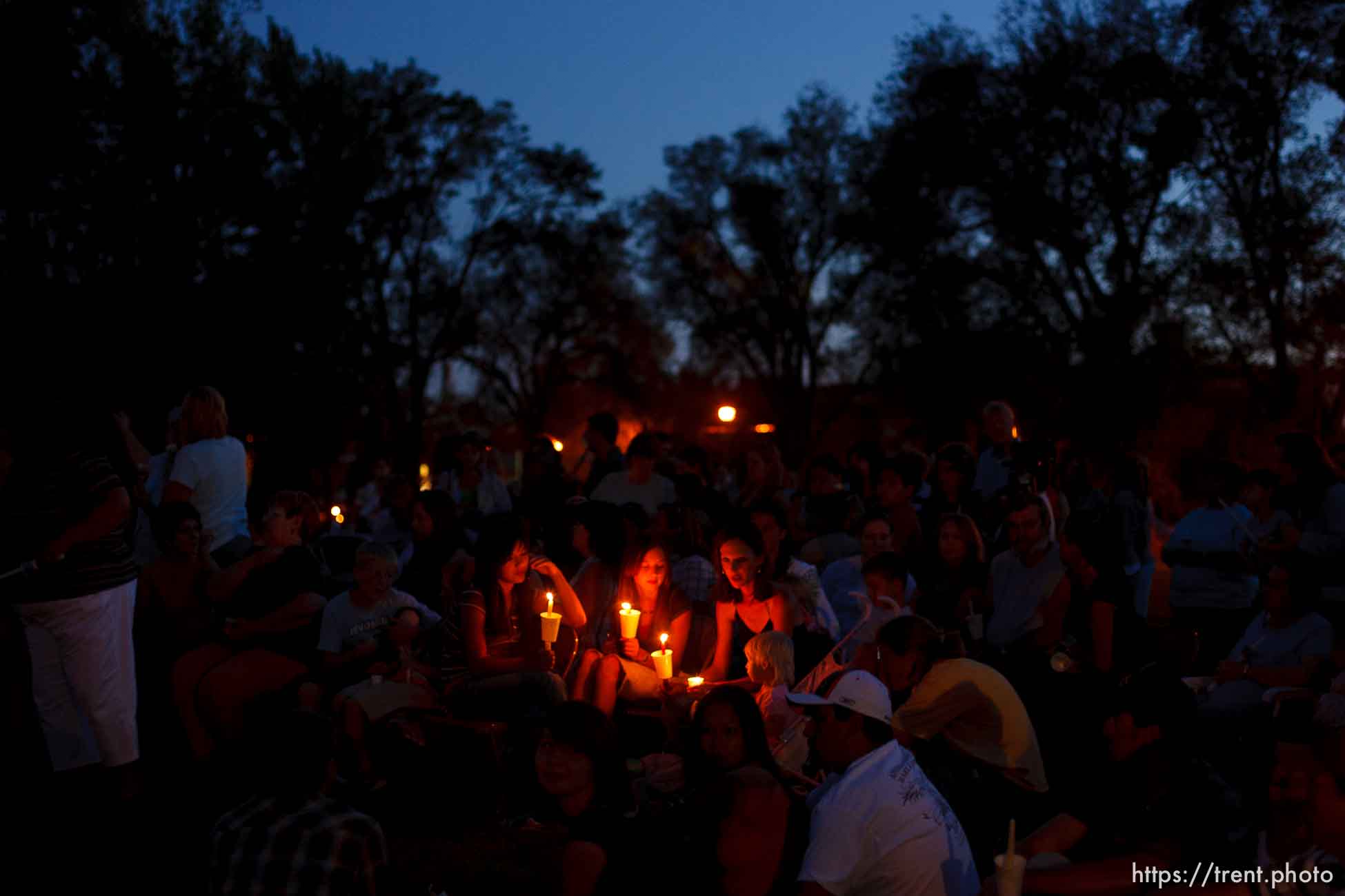 Huntington - Members of the community turned out Friday night for a candlelight vigil for the six trapped miners in the Crandall Canyon Mine.