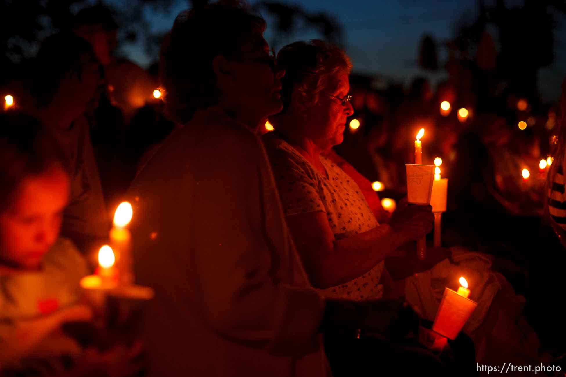 Huntington - Members of the community turned out Friday night for a candlelight vigil for the six trapped miners in the Crandall Canyon Mine.