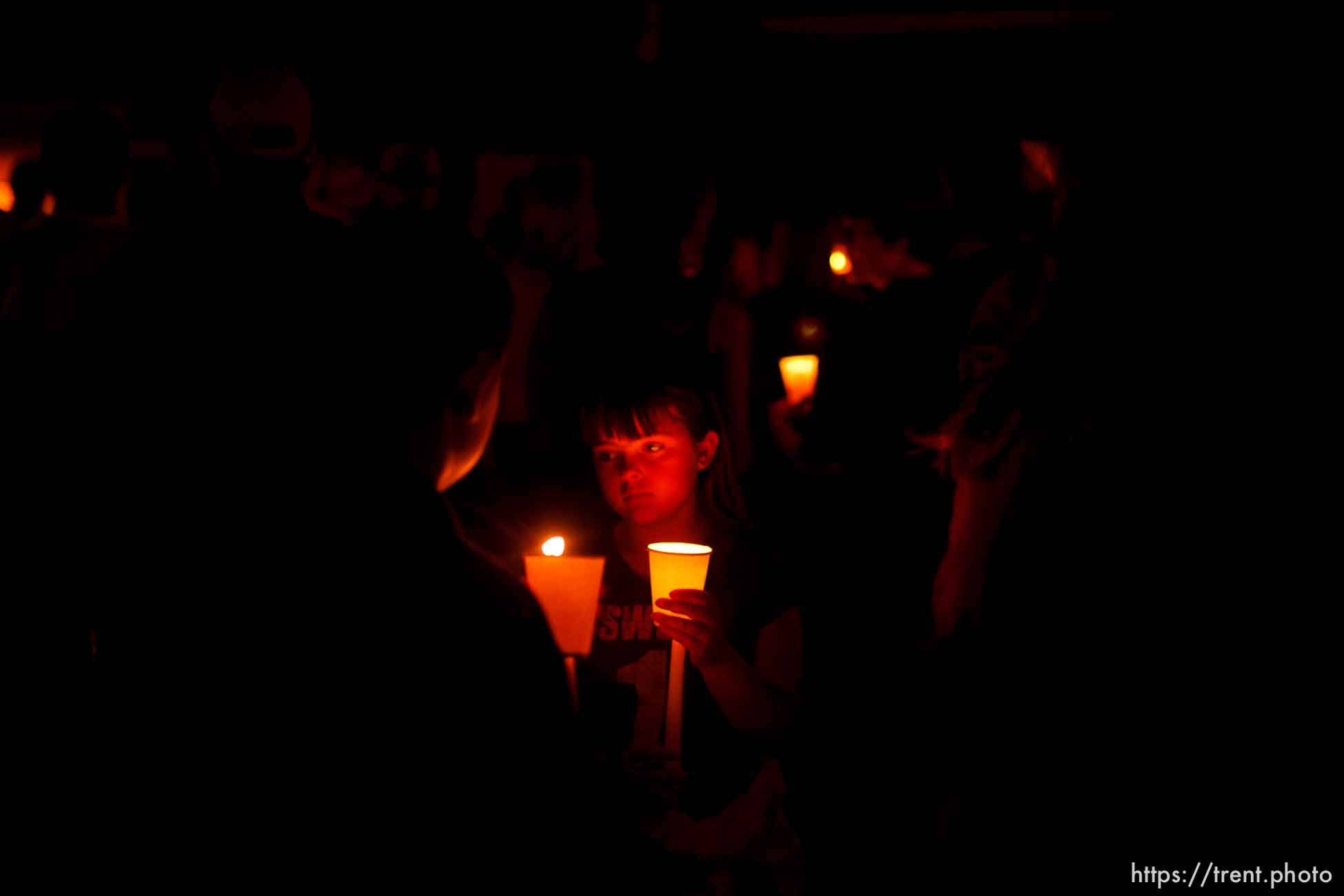 Huntington - Members of the community turned out Friday night for a candlelight vigil for the six trapped miners in the Crandall Canyon Mine.