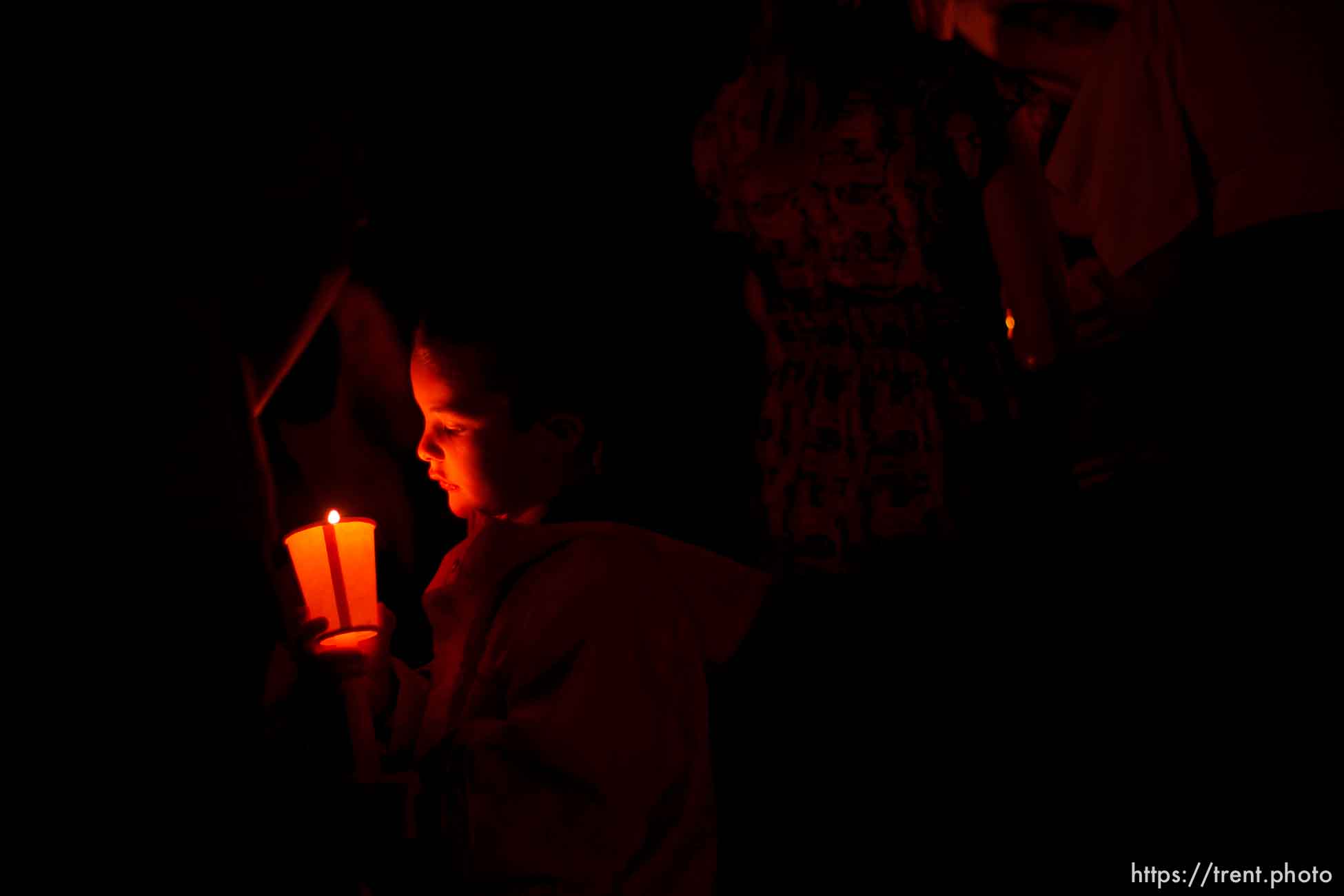 Huntington - Members of the community turned out Friday night for a candlelight vigil for the six trapped miners in the Crandall Canyon Mine.