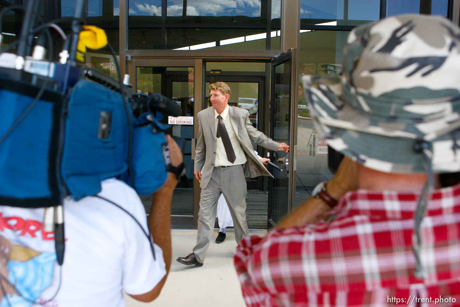 The Warren Jeffs' trial in St. George, Utah. Jeffs, head of the Fundamentalist Church of Jesus Christ of Latter Day Saints, is charged with two counts of rape as an accomplice for allegedly coercing the marriage and rape of a 14-year-old follower to her 19-year-old cousin in 2001.. apparent followers of warren jeffs' flds church