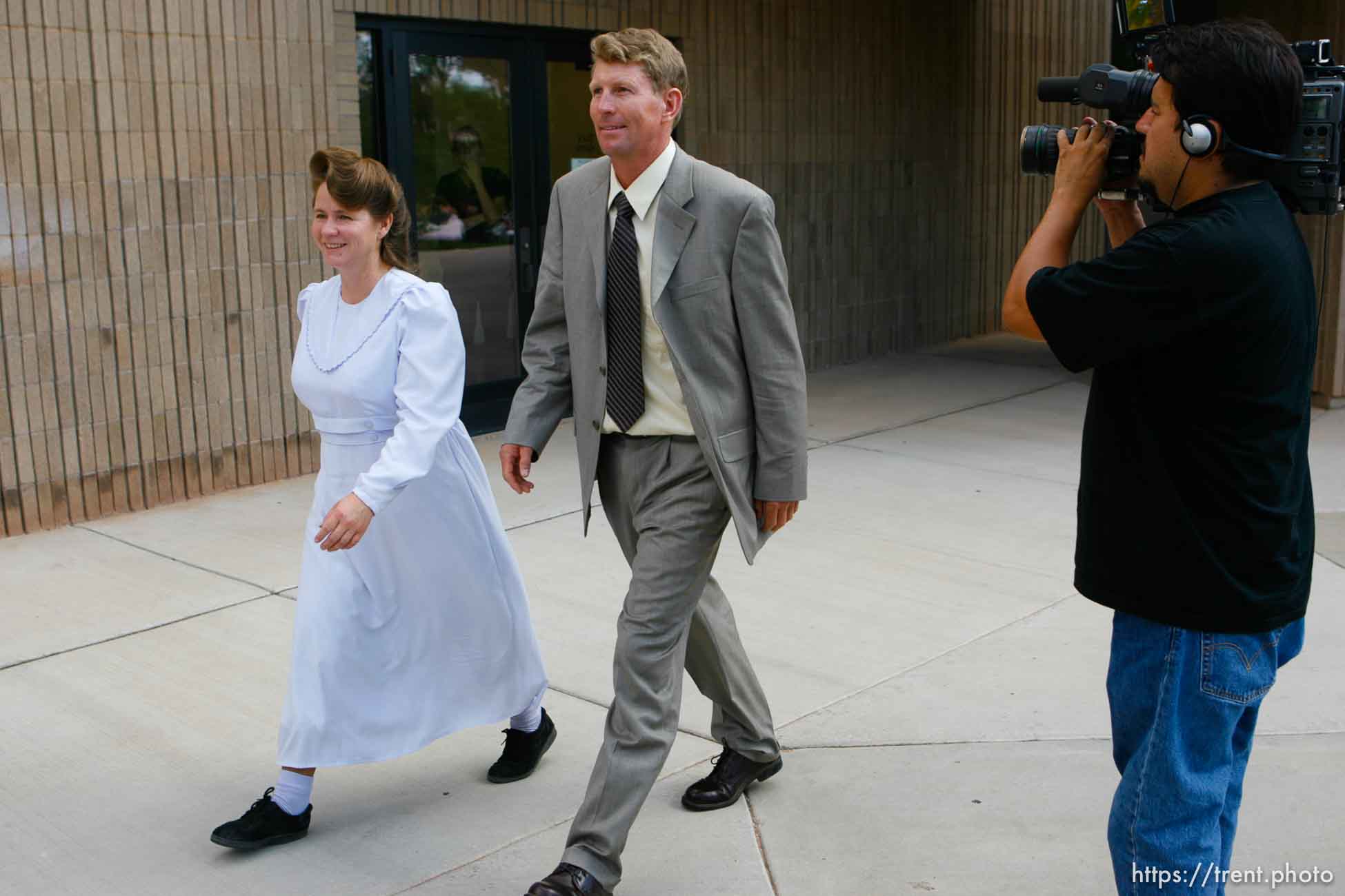 The Warren Jeffs' trial in St. George, Utah. Jeffs, head of the Fundamentalist Church of Jesus Christ of Latter Day Saints, is charged with two counts of rape as an accomplice for allegedly coercing the marriage and rape of a 14-year-old follower to her 19-year-old cousin in 2001.. apparent followers of warren jeffs' flds church