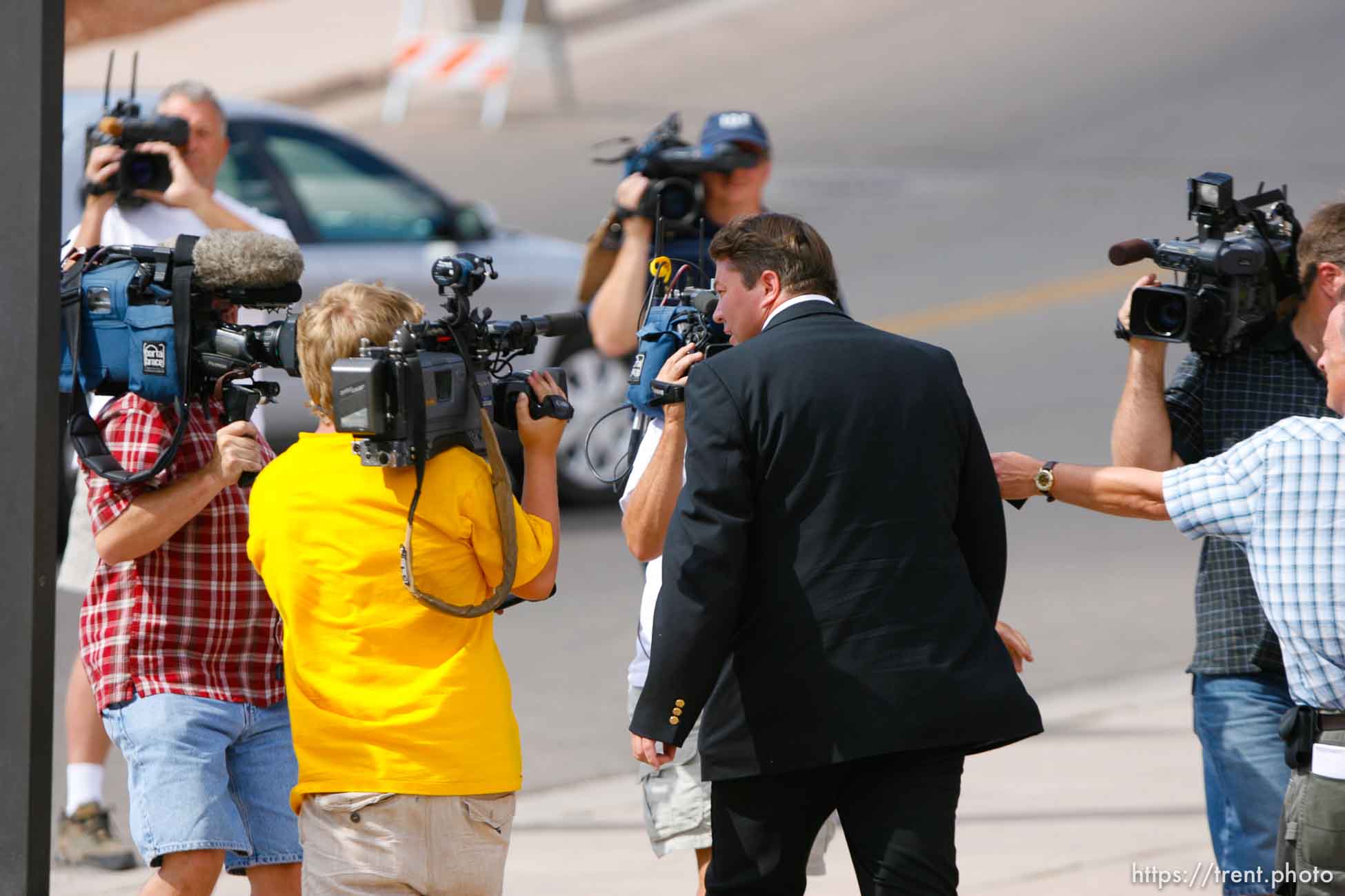 The Warren Jeffs' trial in St. George, Utah. Jeffs, head of the Fundamentalist Church of Jesus Christ of Latter Day Saints, is charged with two counts of rape as an accomplice for allegedly coercing the marriage and rape of a 14-year-old follower to her 19-year-old cousin in 2001.. apparent followers of warren jeffs' flds church. willie jessop removed from courtroom.