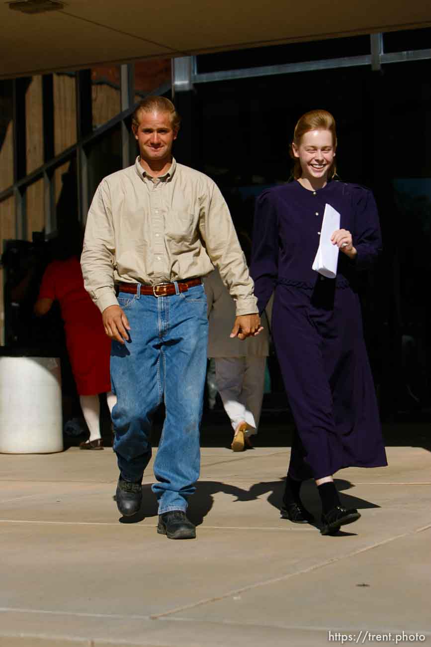 The Warren Jeffs' trial in St. George, Utah. Jeffs, head of the Fundamentalist Church of Jesus Christ of Latter Day Saints, is charged with two counts of rape as an accomplice for allegedly coercing the marriage and rape of a 14-year-old follower to her 19-year-old cousin in 2001.. apparent followers of warren jeffs' flds church, Defense witnesses Merril Shapley and Christine Shapley