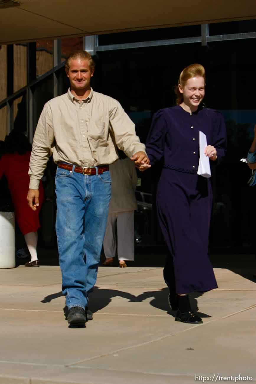 The Warren Jeffs' trial in St. George, Utah. Jeffs, head of the Fundamentalist Church of Jesus Christ of Latter Day Saints, is charged with two counts of rape as an accomplice for allegedly coercing the marriage and rape of a 14-year-old follower to her 19-year-old cousin in 2001.. apparent followers of warren jeffs' flds church, Defense witnesses Merril Shapley and Christine Shapley