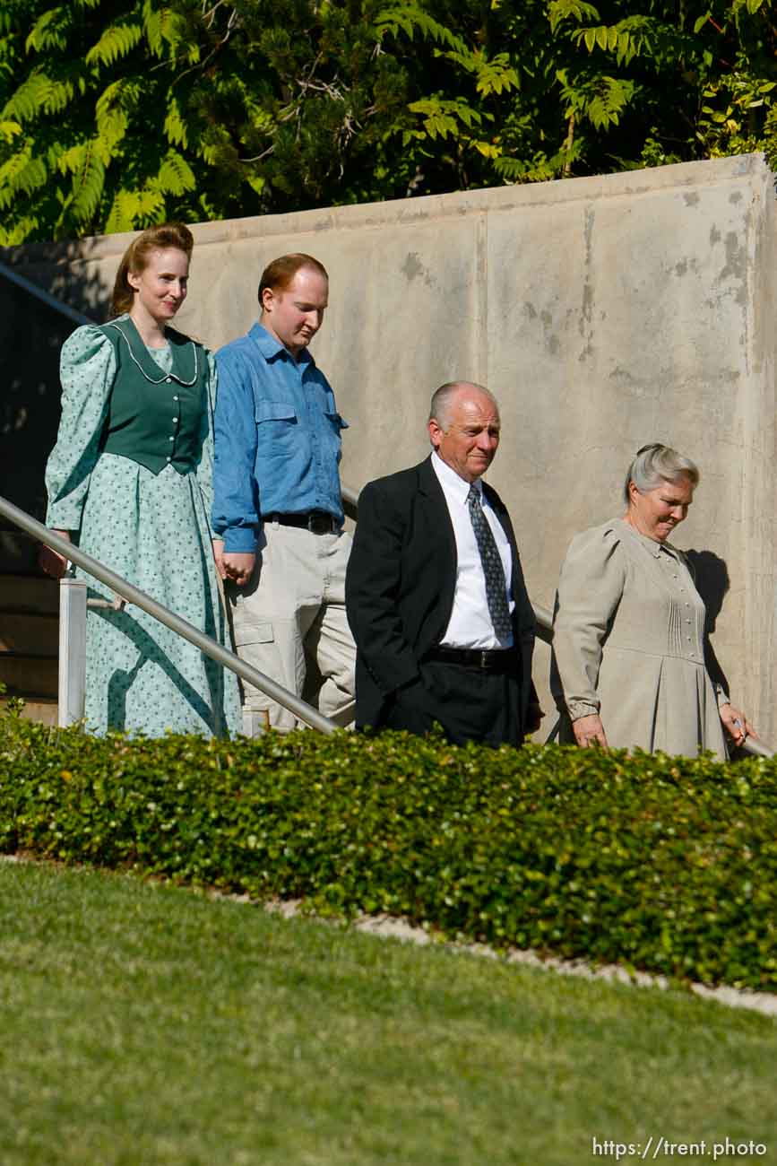 The Warren Jeffs' trial in St. George, Utah. Jeffs, head of the Fundamentalist Church of Jesus Christ of Latter Day Saints, is charged with two counts of rape as an accomplice for allegedly coercing the marriage and rape of a 14-year-old follower to her 19-year-old cousin in 2001.. apparent followers of warren jeffs' flds church, younger couple at left is Joanna Keate and John Keate.