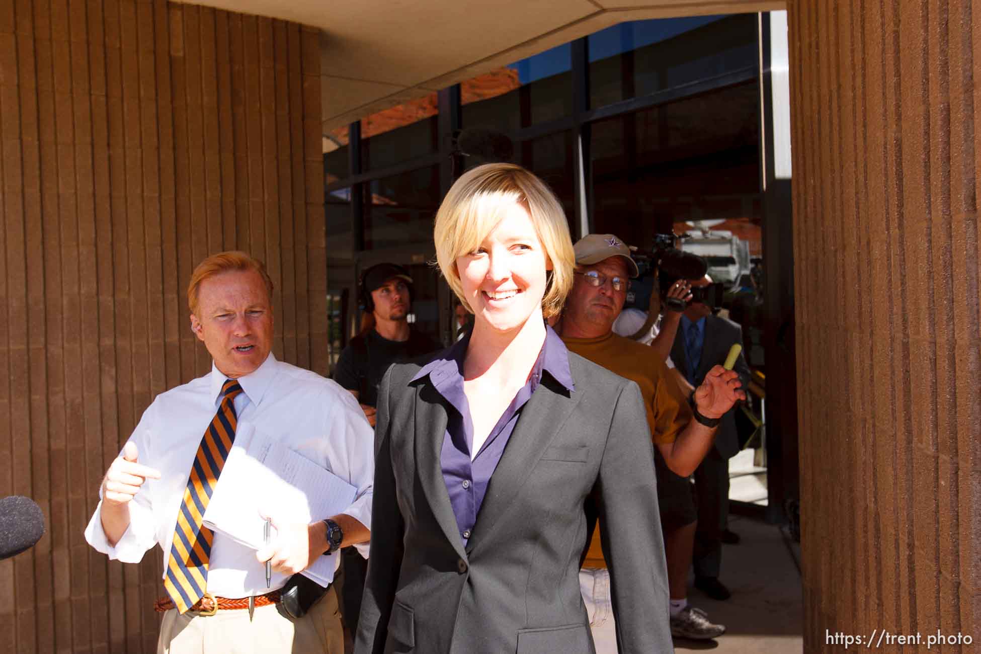 defense attorney Tara Isaacson, Brent Hunsaker. St. George - Warren Jeffs trial. The polygamous sect leader was charged with two counts of rape as an accomplice stemming from a marriage he officiated involving a 14-year-old girl and her 19-year-old cousin.