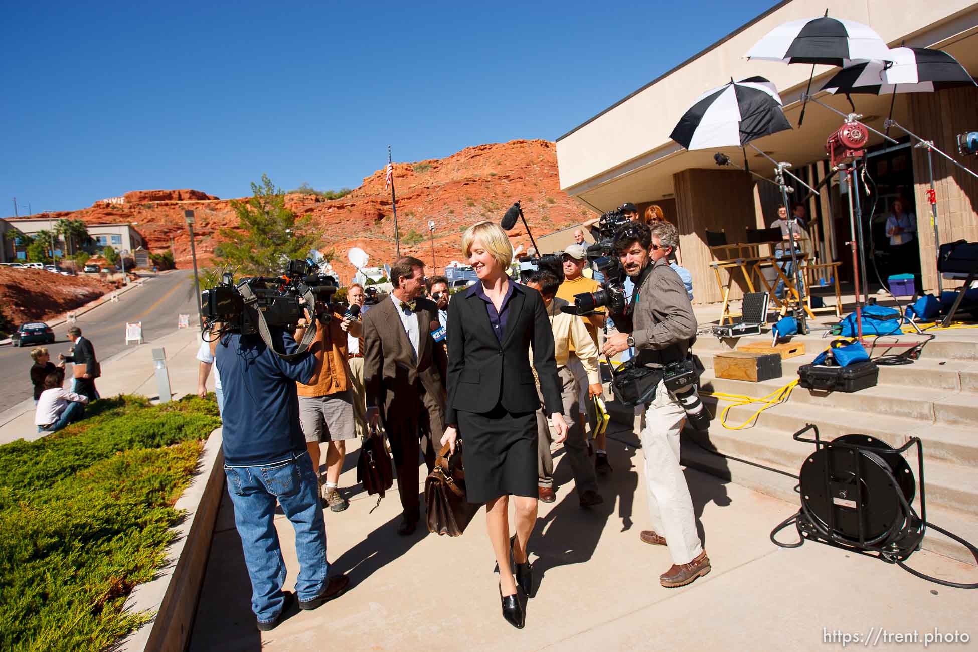 defense attorney Tara Isaacson, Walter Bugden and media. St. George - Warren Jeffs trial. The polygamous sect leader was charged with two counts of rape as an accomplice stemming from a marriage he officiated involving a 14-year-old girl and her 19-year-old cousin. photographer steve marcus