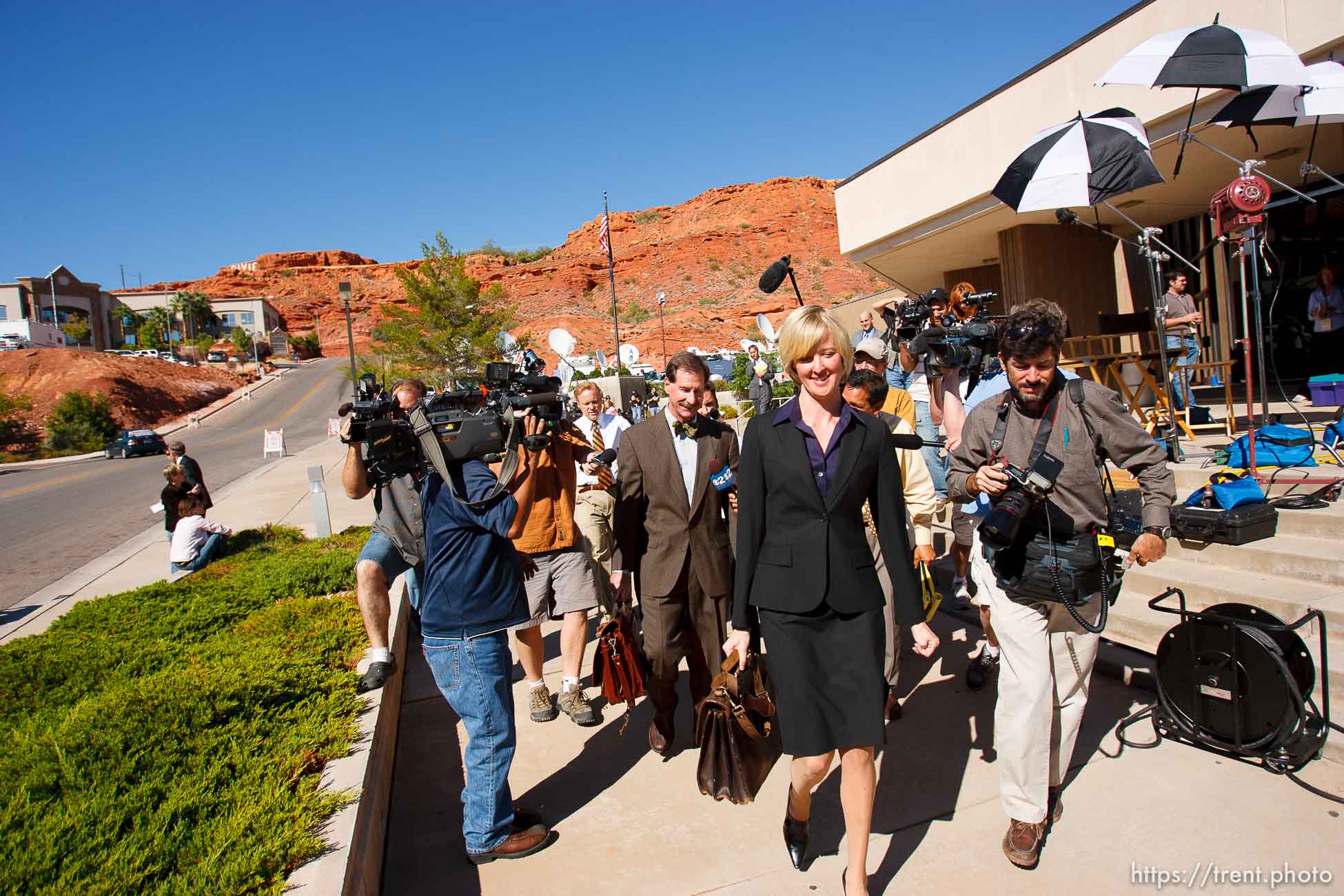 defense attorney Tara Isaacson, Walter Bugden and media. St. George - Warren Jeffs trial. The polygamous sect leader was charged with two counts of rape as an accomplice stemming from a marriage he officiated involving a 14-year-old girl and her 19-year-old cousin. photographer steve marcus