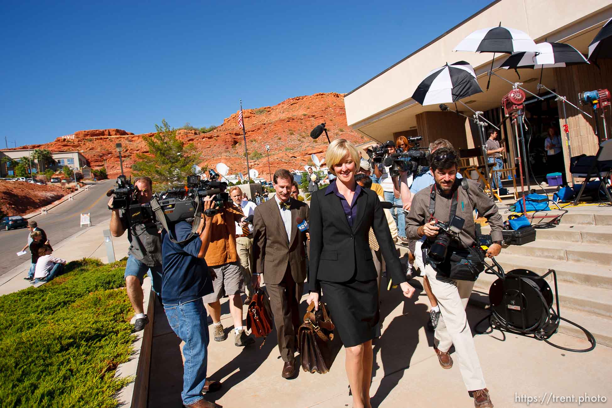 defense attorney Tara Isaacson, Walter Bugden and media. St. George - Warren Jeffs trial. The polygamous sect leader was charged with two counts of rape as an accomplice stemming from a marriage he officiated involving a 14-year-old girl and her 19-year-old cousin. photographer steve marcus