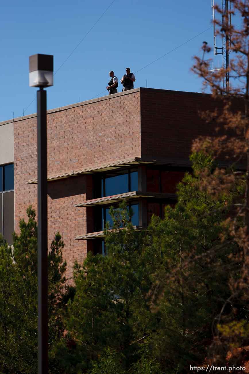 police working security. St. George - Warren Jeffs trial. The polygamous sect leader was charged with two counts of rape as an accomplice stemming from a marriage he officiated involving a 14-year-old girl and her 19-year-old cousin.