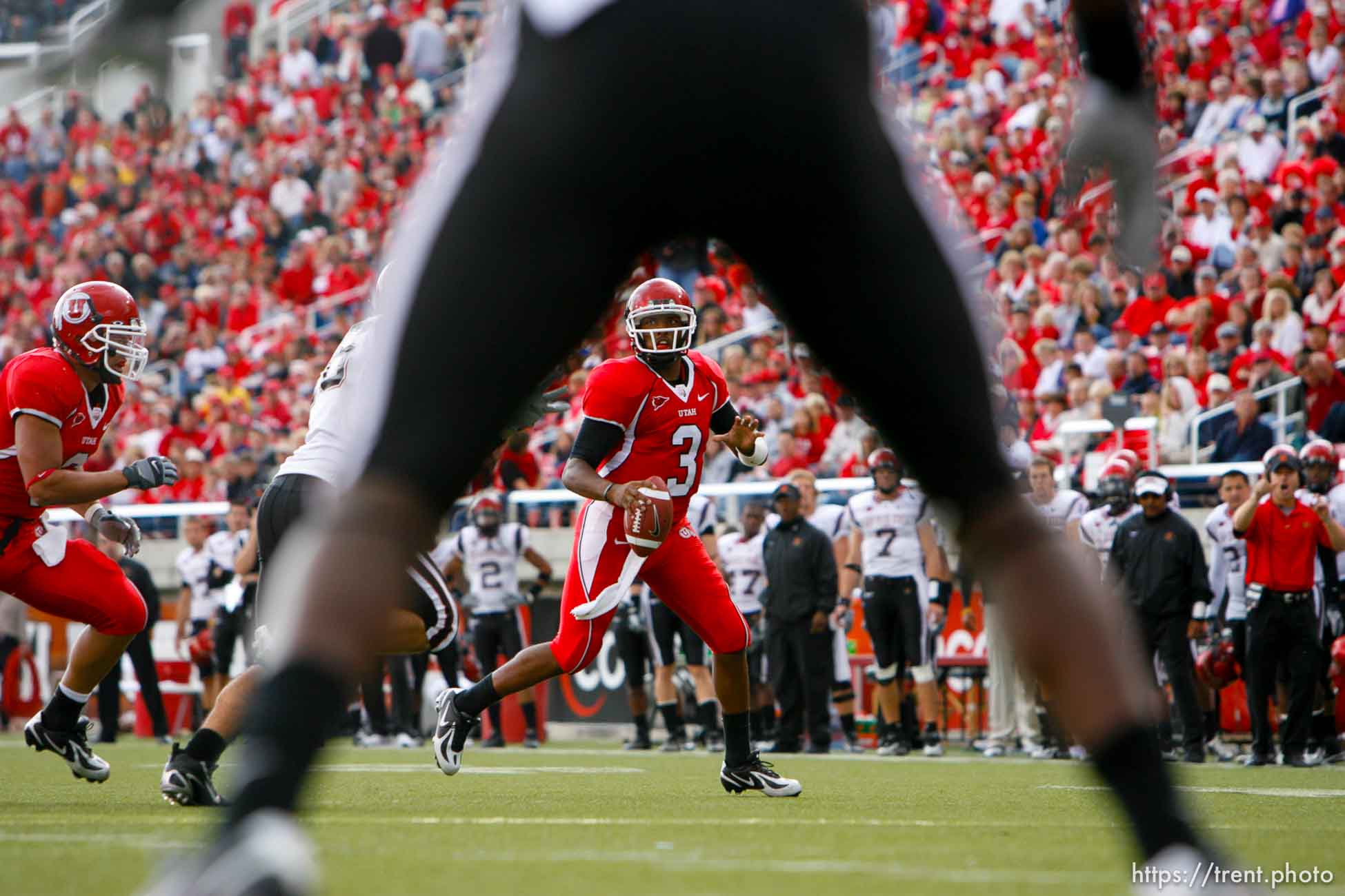 Salt Lake City - Utah quarterback Brian Johnson scrambles. Utah vs San Diego State (SDSU) college football at Rice-Eccles Stadium.